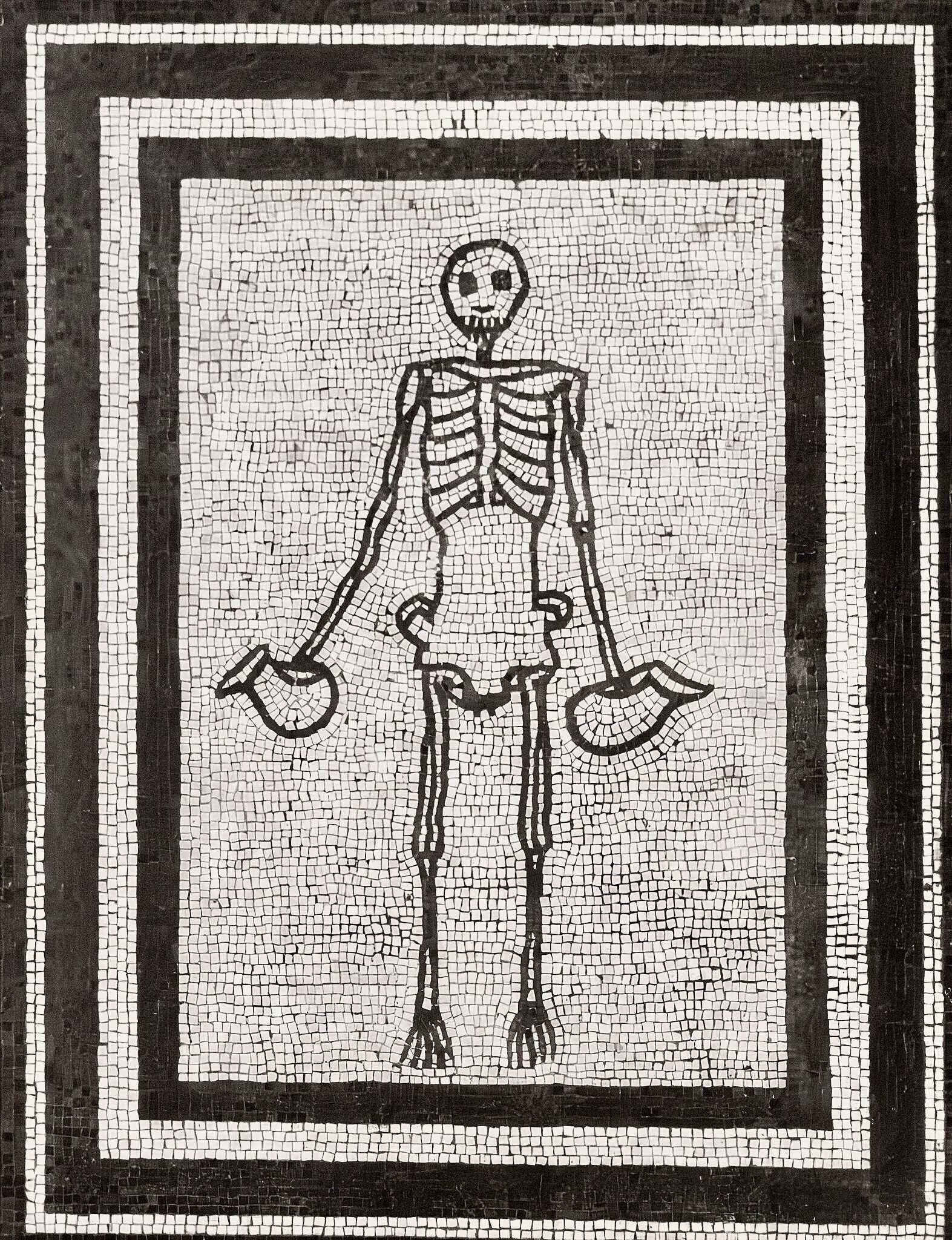 A memento mori mosaic from the floor of the triclinium (dining room) of the House of the Faun in Pompeii, this skeleton holding two askoi (wine jugs) was a reminder to the diners of 'carpe diem', to 'seize the day' and enjoy the food and wine