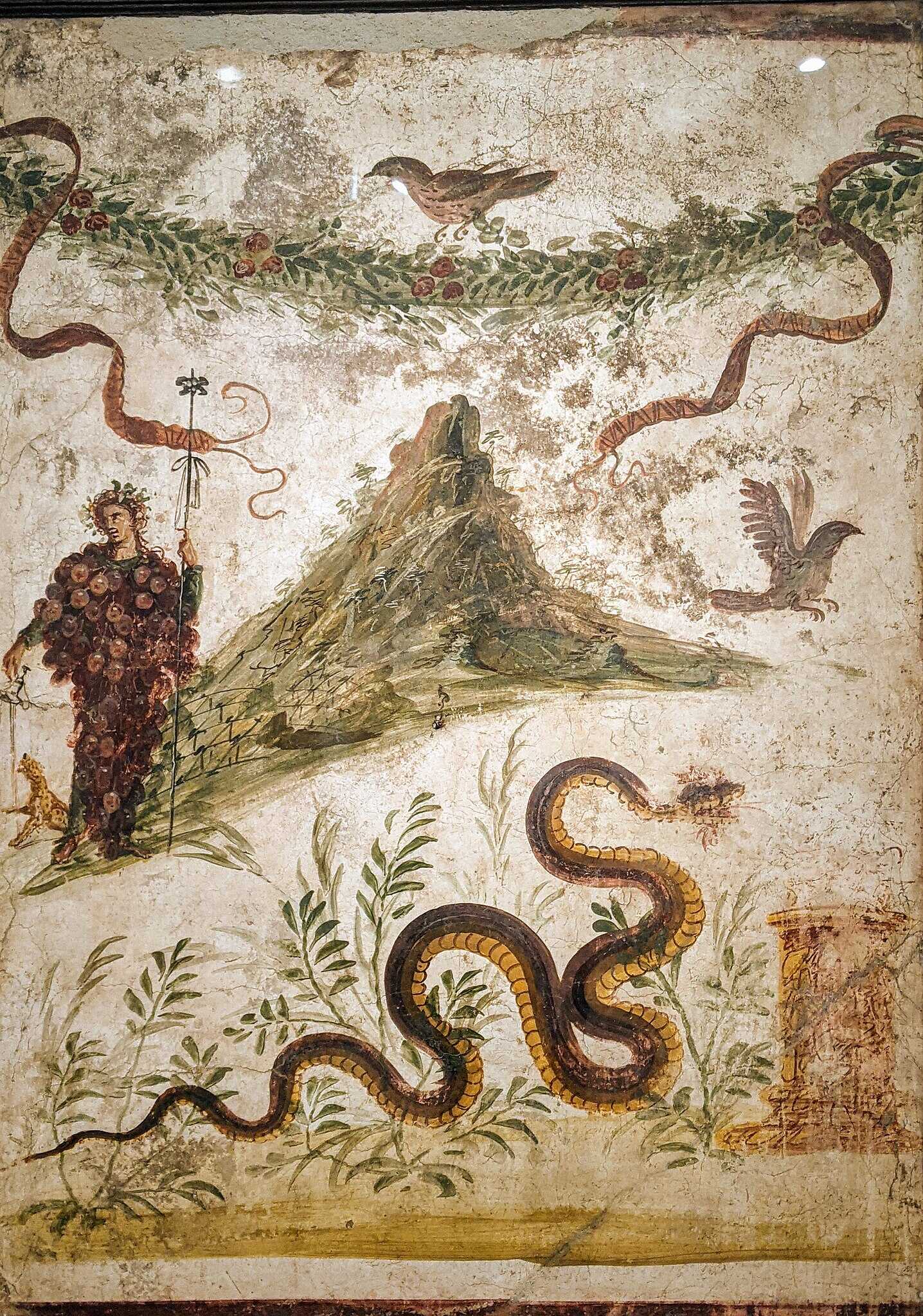 Fresco from Pompeii depicting the wine god Bacchus and Mount Vesuvius laden with vines