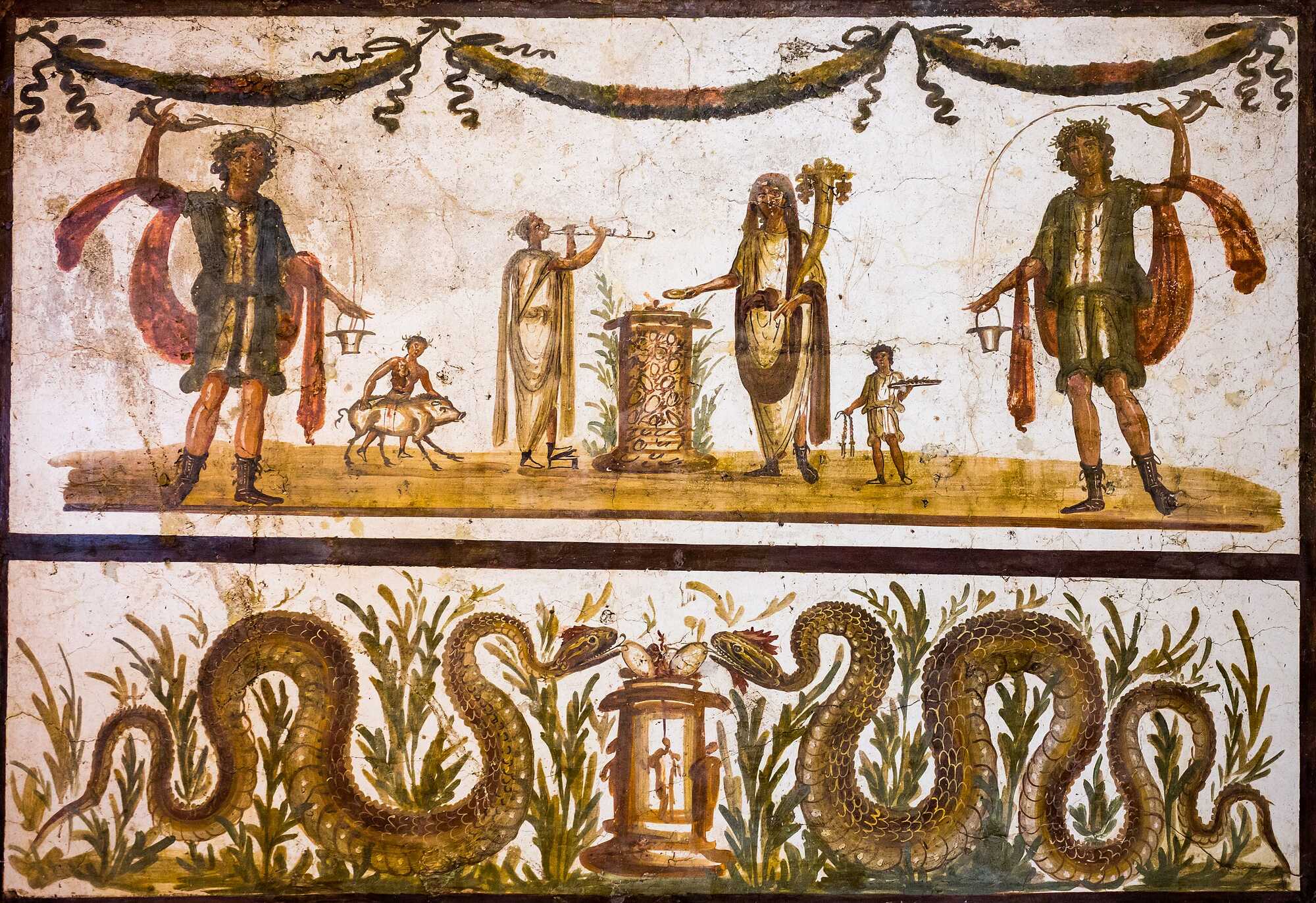 A fresco depicting a Roman lararium, and below an altar with fruits and eggs between two benevolent snakes (agathodaimones)