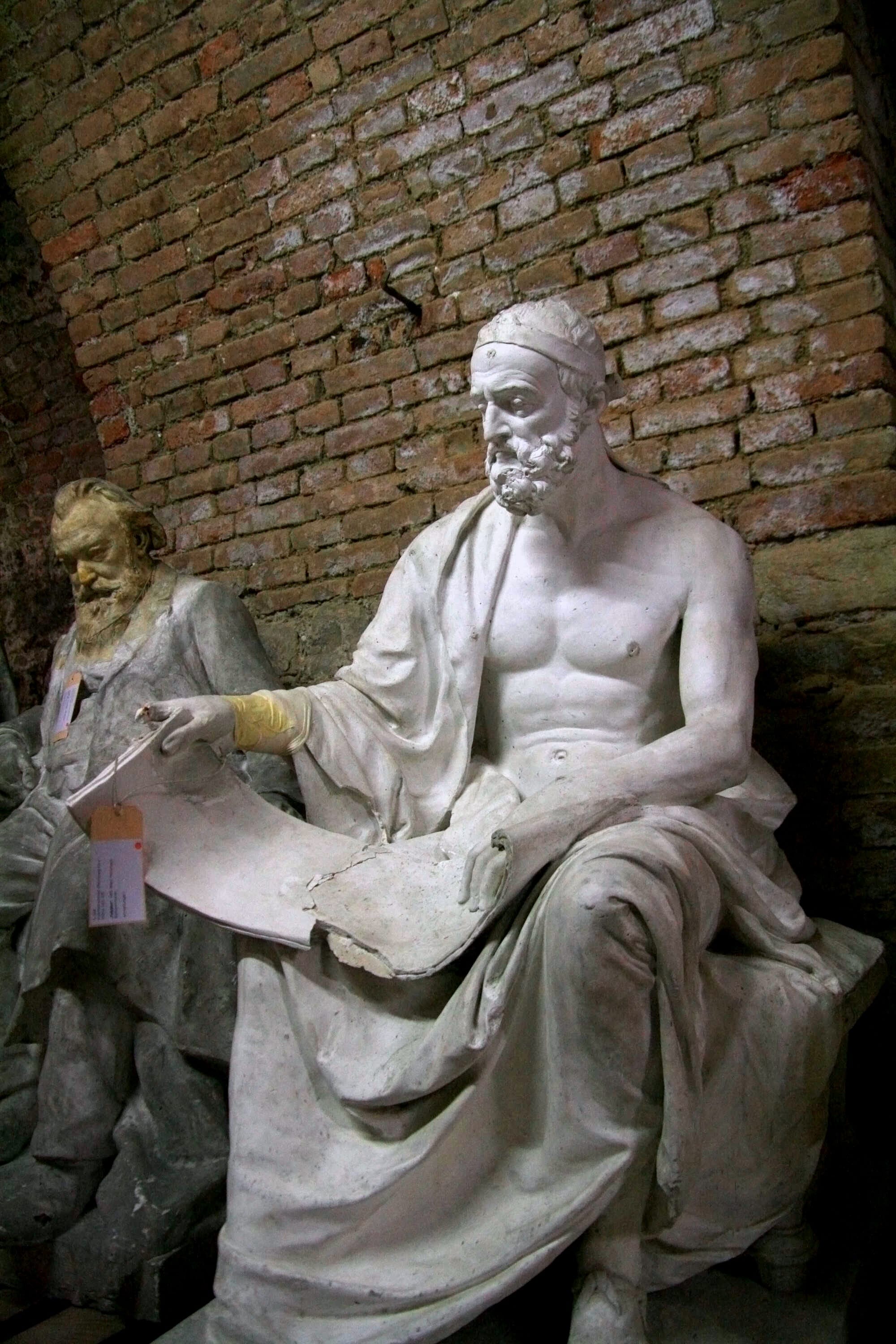 The Greek historian polybius. Models made of gypsum of statues, reliefs etc. from the time of Historicism and Art Nouveau (late 19th and early 20th century) for buildings at Ringstraße in Vienna, Austria, stored in the former wine cellar of Hofburg Palace (Leopold Wing).