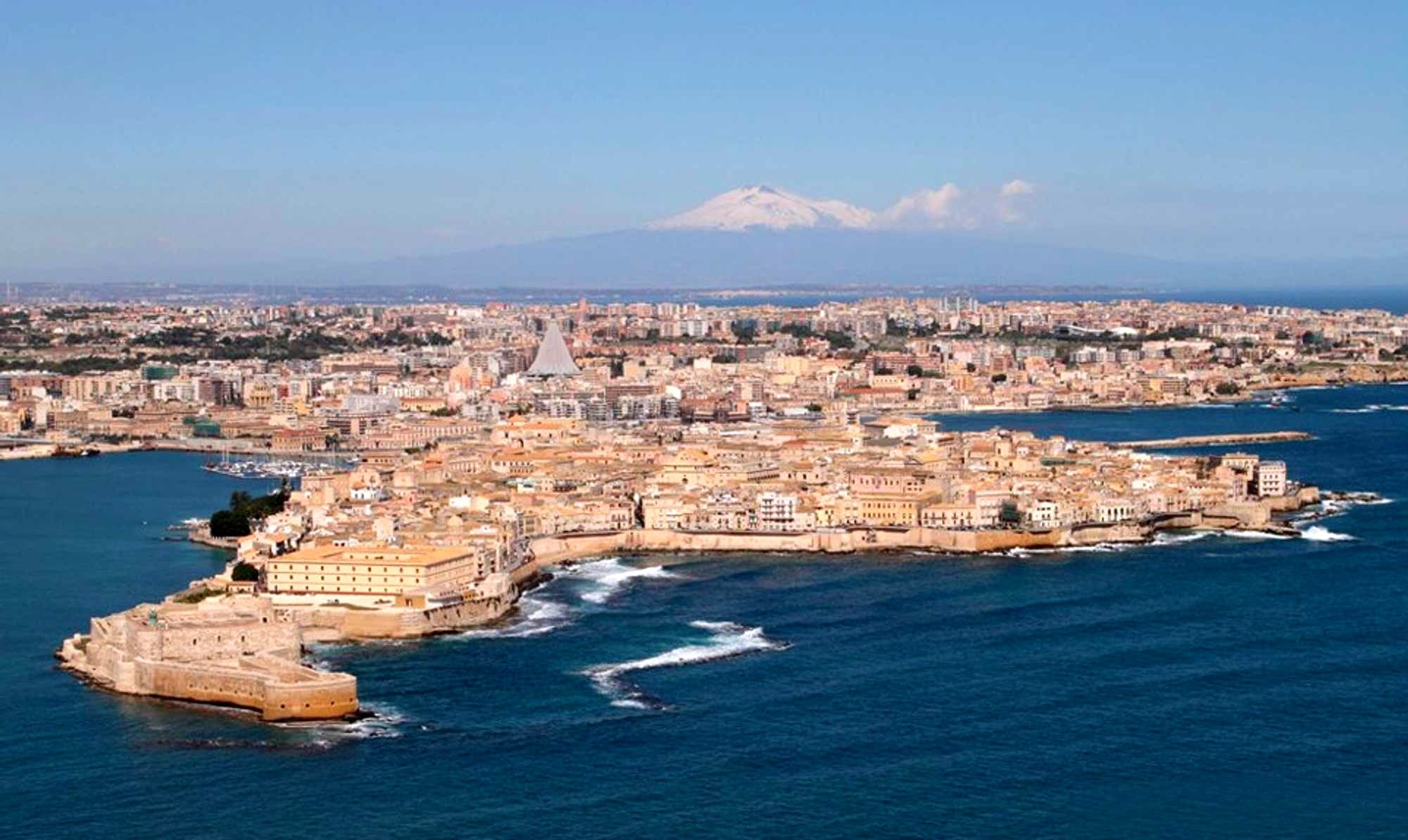 Aerial view of Syracuse with Mount Etna in the background