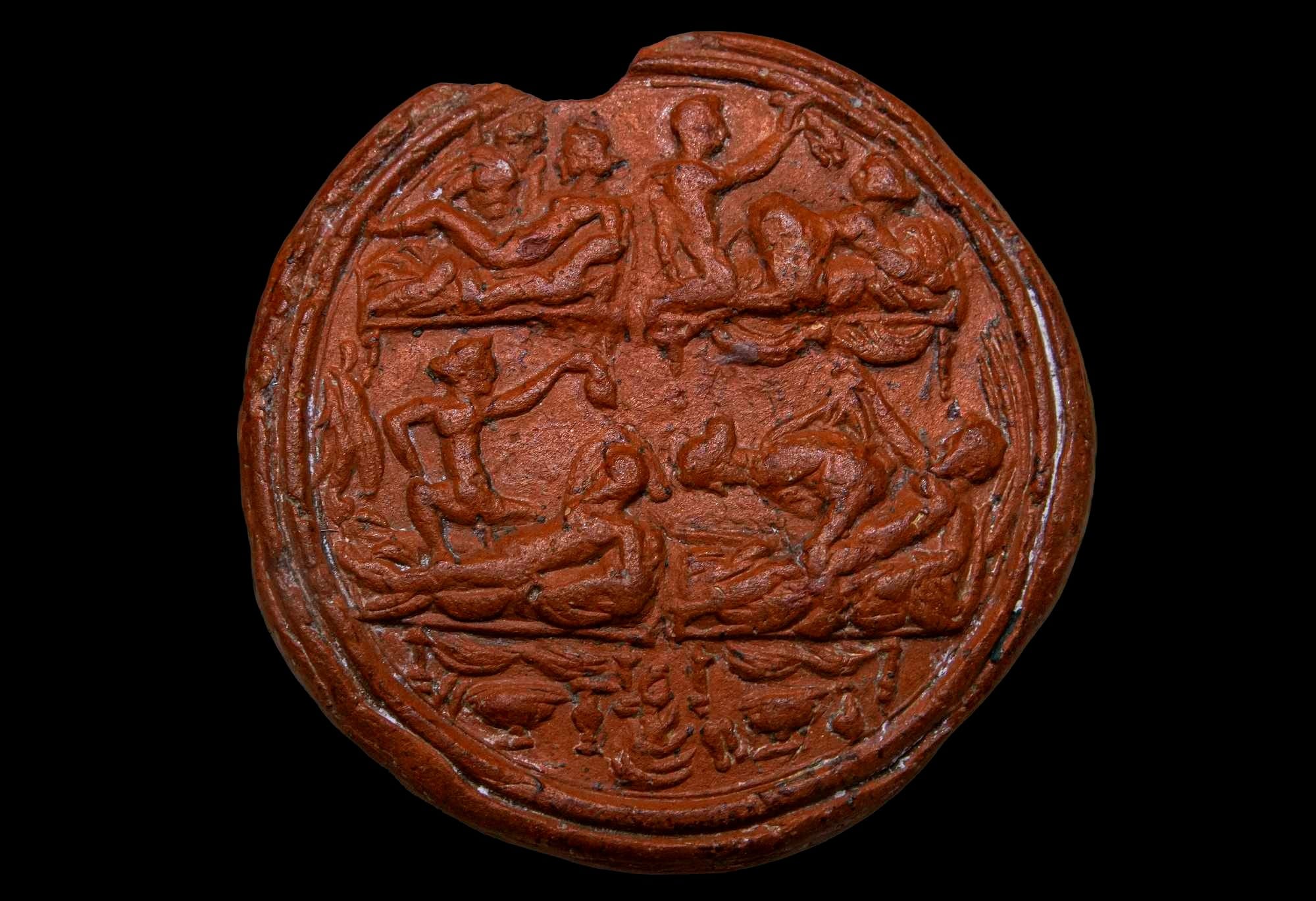 Four images of sex between a female and a male. Applied pottery medallion. Date: 2nd to 3rd Century CE.