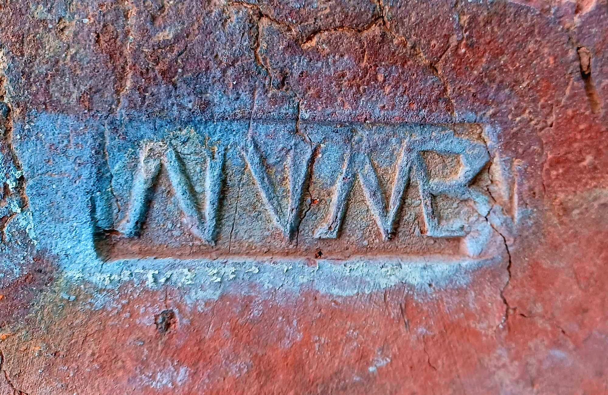 Fragment of a Roman building brick, with a brick stamp bearing the inscription " NVM(erus)B(oiodurensium) ", recovered in 1961 during the excavation of a Roman military brickworks in St. Marienkirchen near Schärding.