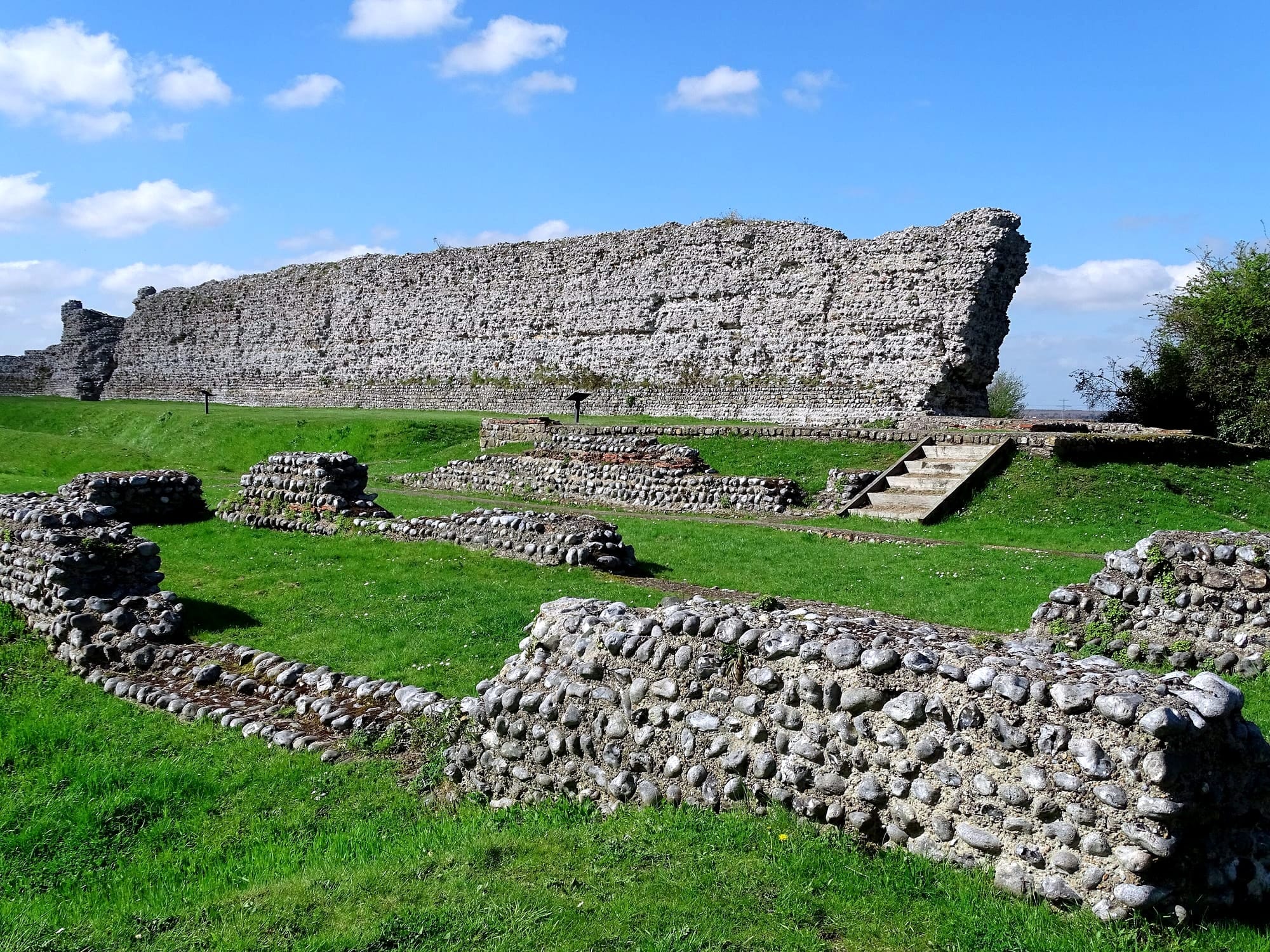 The remains of the north wall of Richborough Castle a Roman Saxon Shore fort in Richborough, Kent, England, UK.