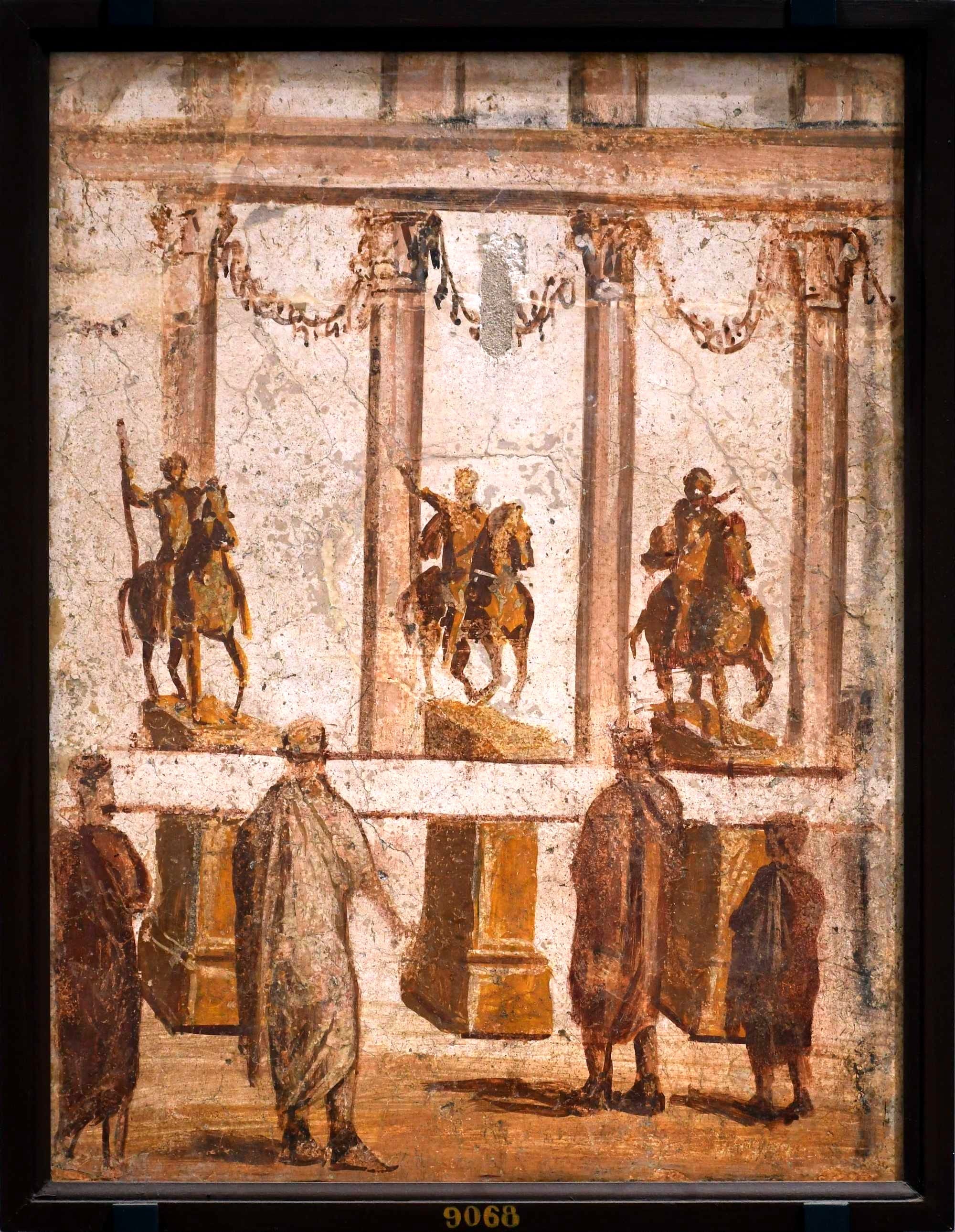 The Naples National Archaeological Museum, in Italy. Fresco from the House of Julia Felix: reading of inscription attached to three statue bases.