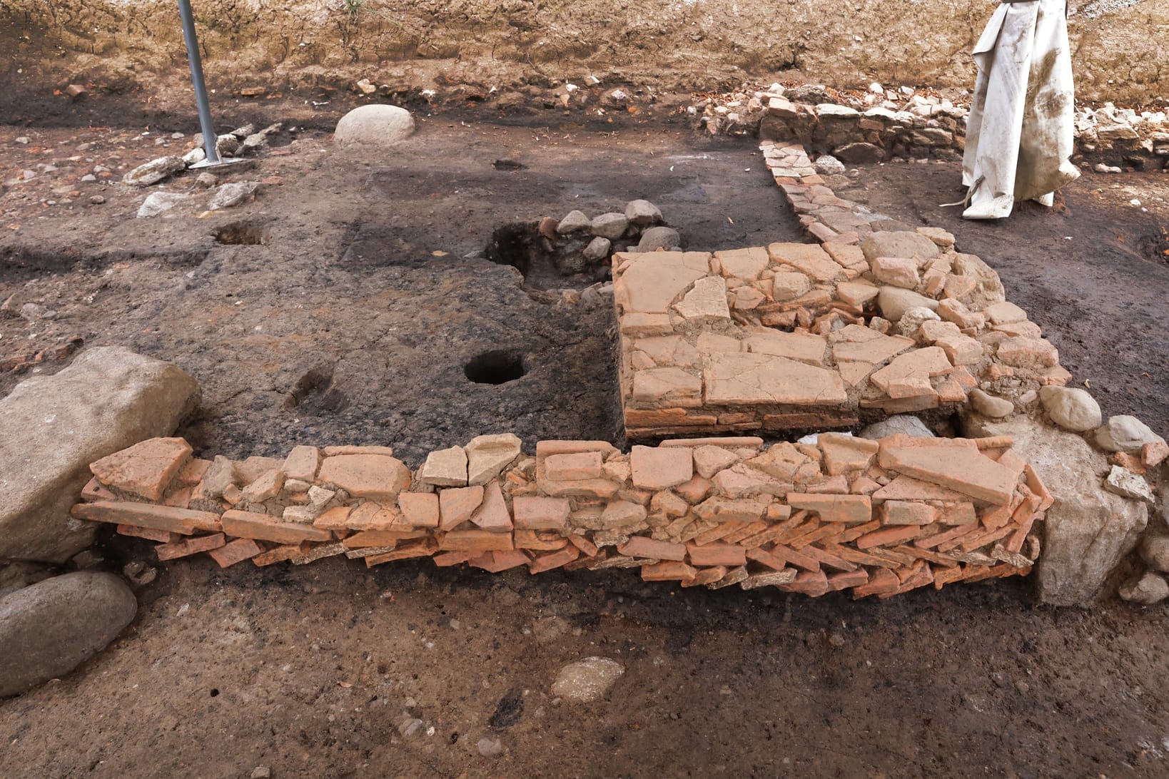 Reused brick platform in the portico
