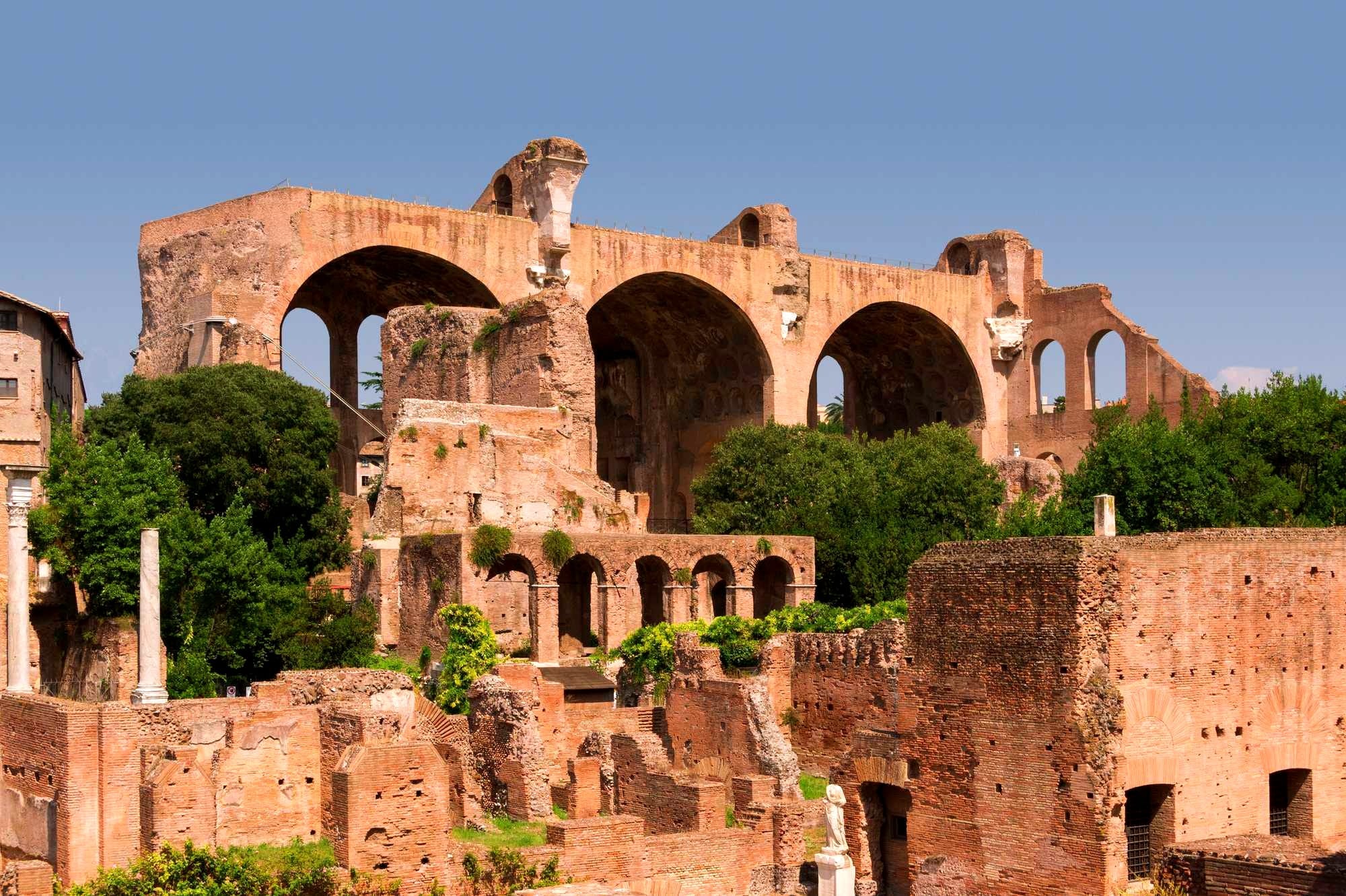 Forum Romanum. In background, the remains of the Basilica of Maxentius and Constantine. Rome, Italy.