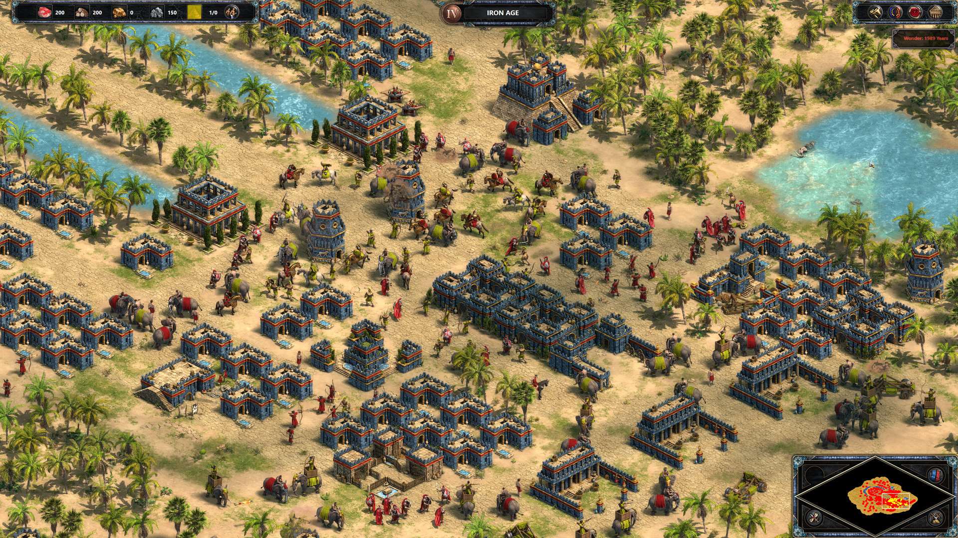 Infantry, cavalry and war elephants fight among walls and towers beside a river in Age of Empires: Definitive Edition.