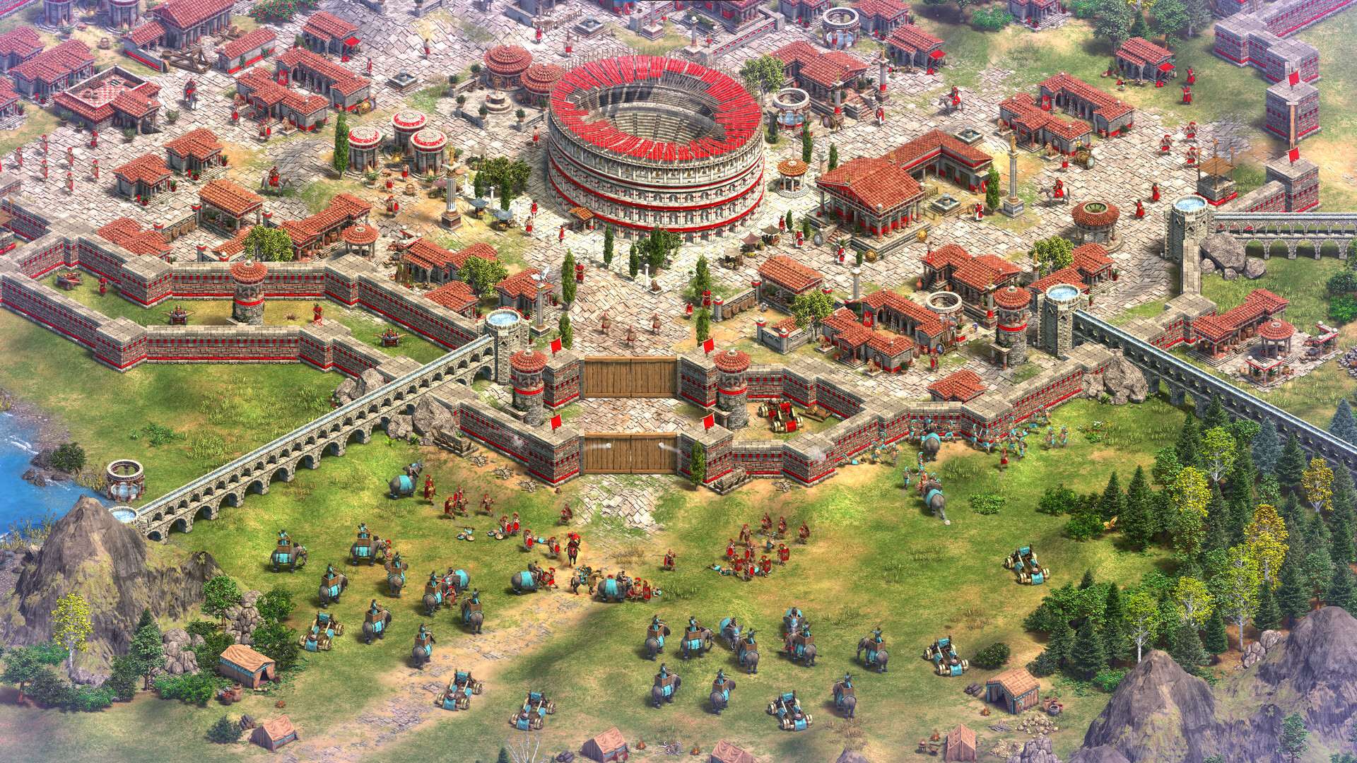 Roman troops and cavalry gather outside a walled city with an amphitheatre in Age of Empires II: Definitive Edition — Return of Rome.