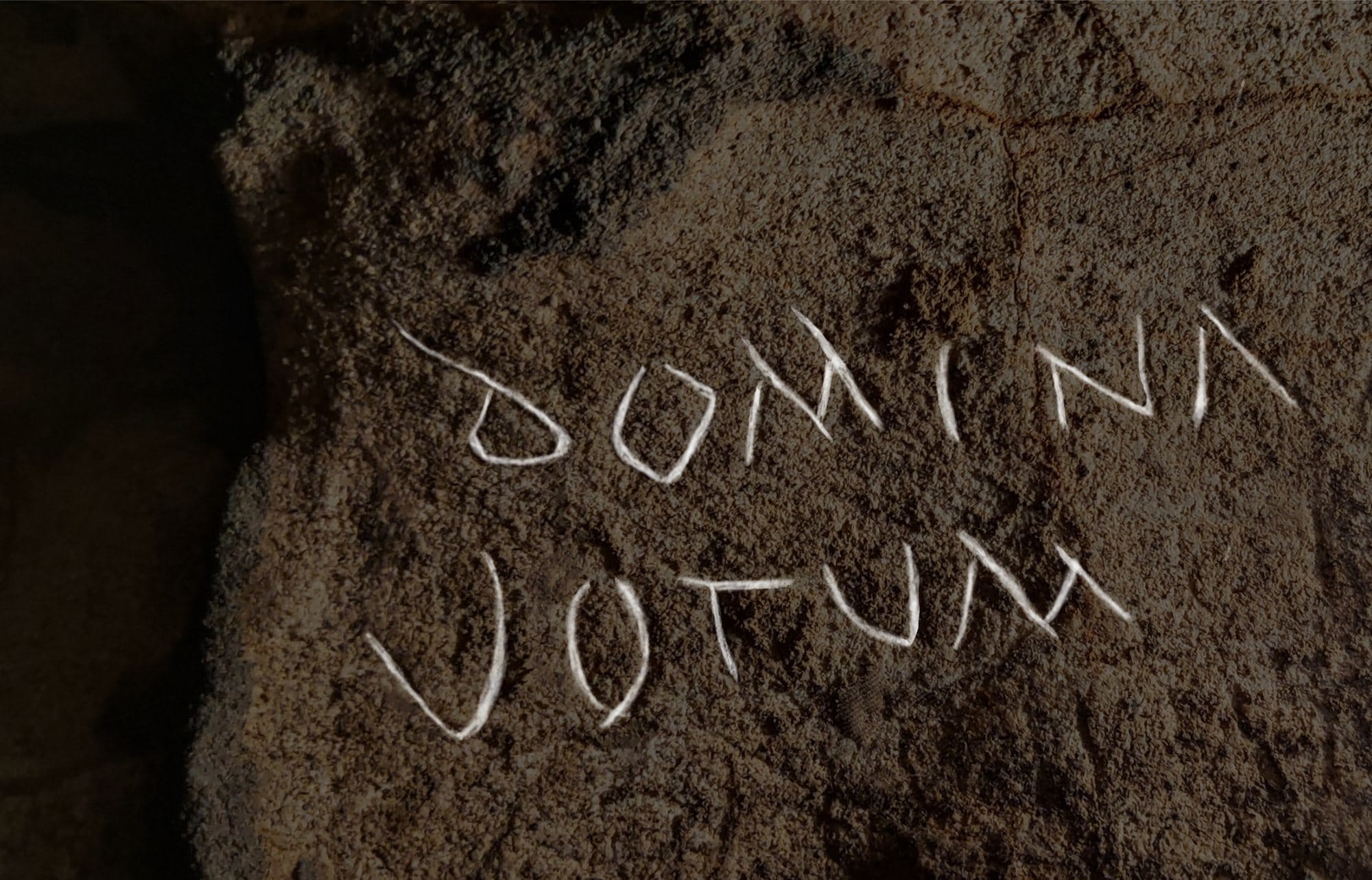 The Cova Dones inscription with DOMINA and VOTVM highlighted in white by the research team.