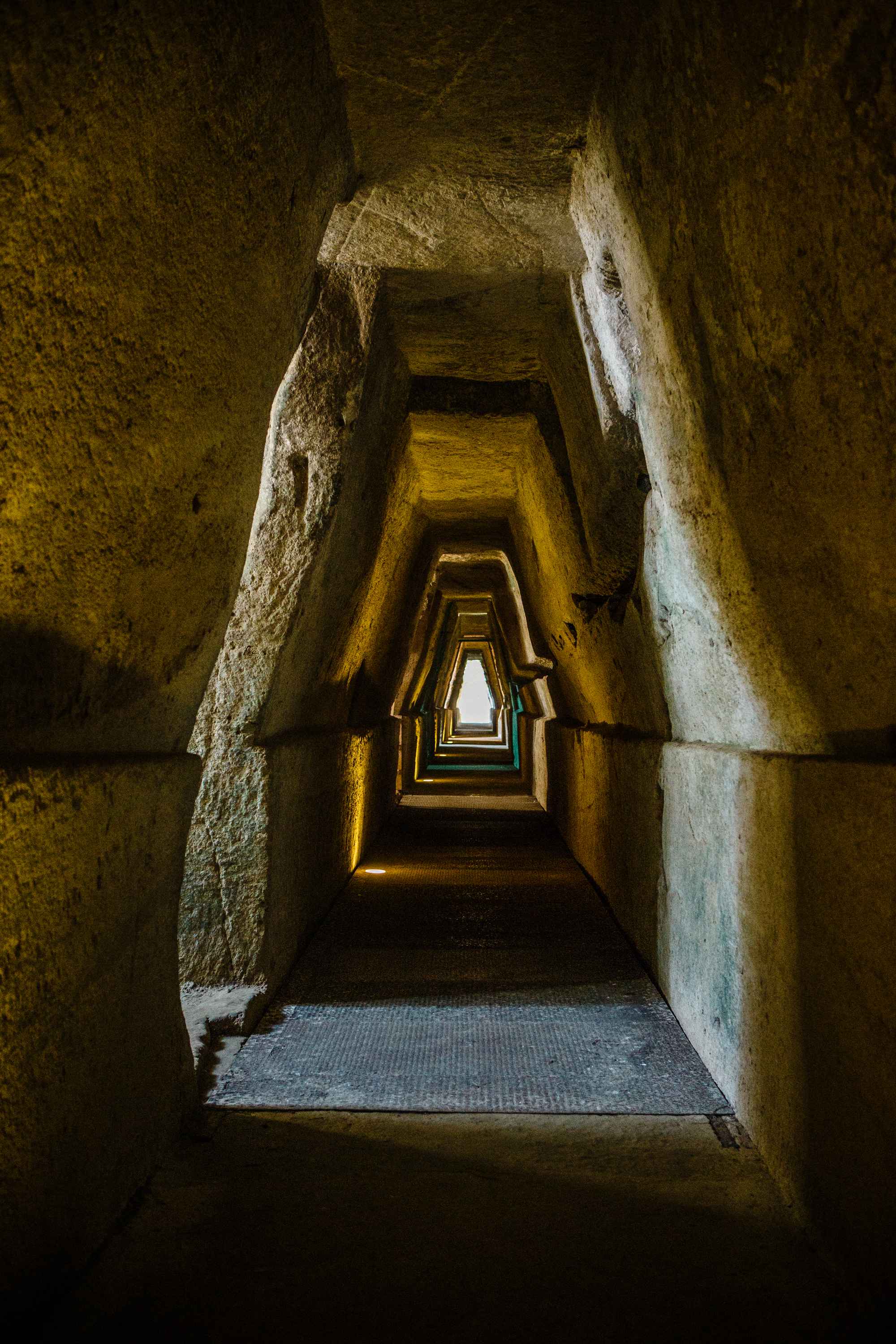 The long rock-cut passage traditionally known as the Sibyl’s Cave at Cumae, lit through openings along one side.