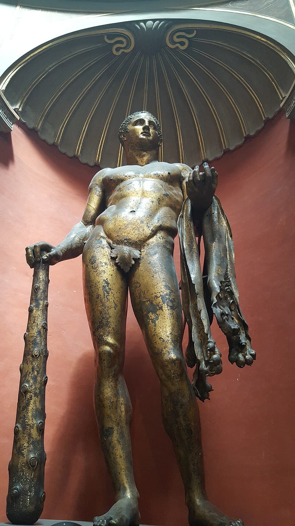 Gilded bronze statue of Hercules Mastai in the Vatican Museums, photographed from the front.