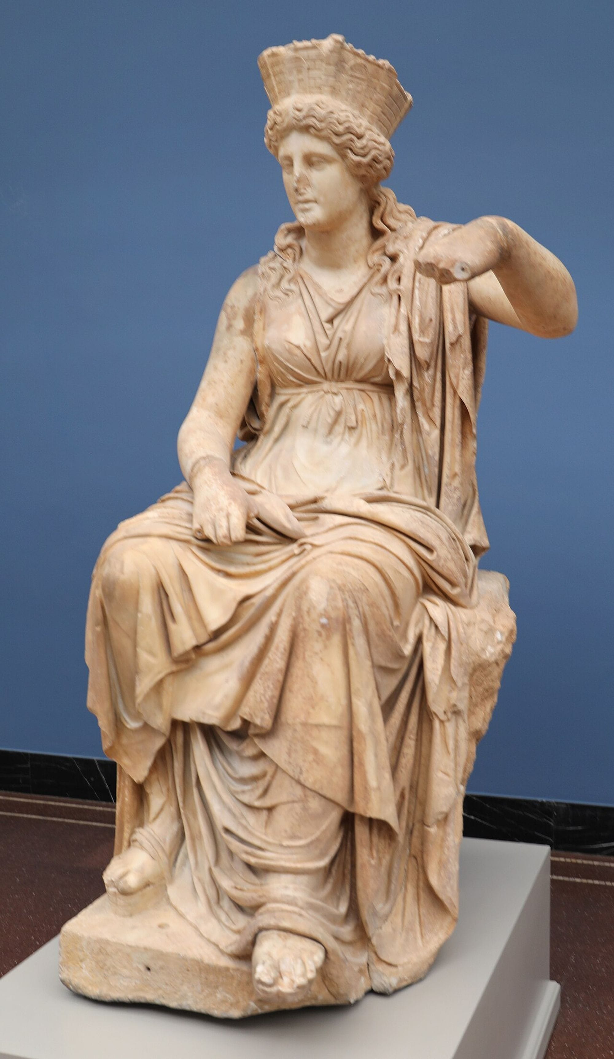 Seated Roman marble statue of Cybele wearing a turreted crown, from Formia, at the Ny Carlsberg Glyptotek.