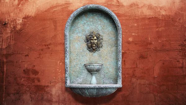 Details of a Roman Fountain, featuring possibly the Head of Greek God Dionysus.