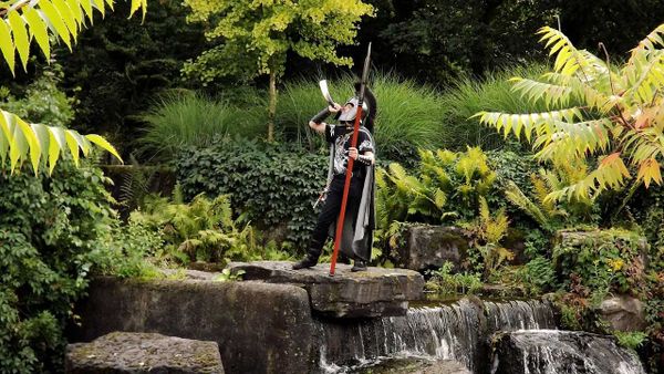 An ancient warrior blowing his horn