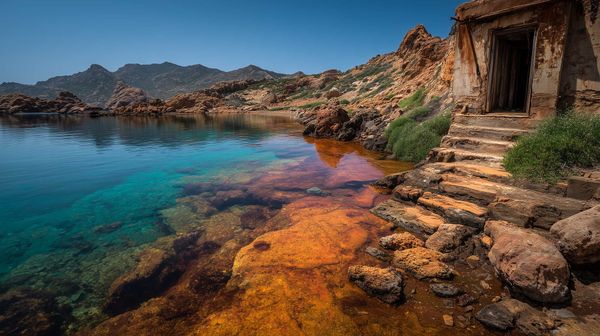 A possible representation of a coastal Roman mine, with its byproducts directly polluting the Mediterranean sea