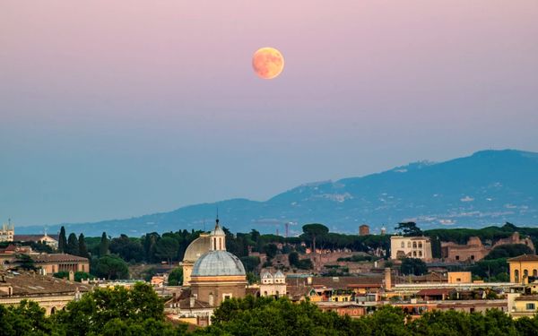 Full Moon rising over Rome. 