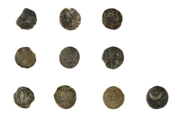 Ten worn silver denarii arranged in three rows on white, from a Staffordshire hoard containing Republican and Augustan coins.