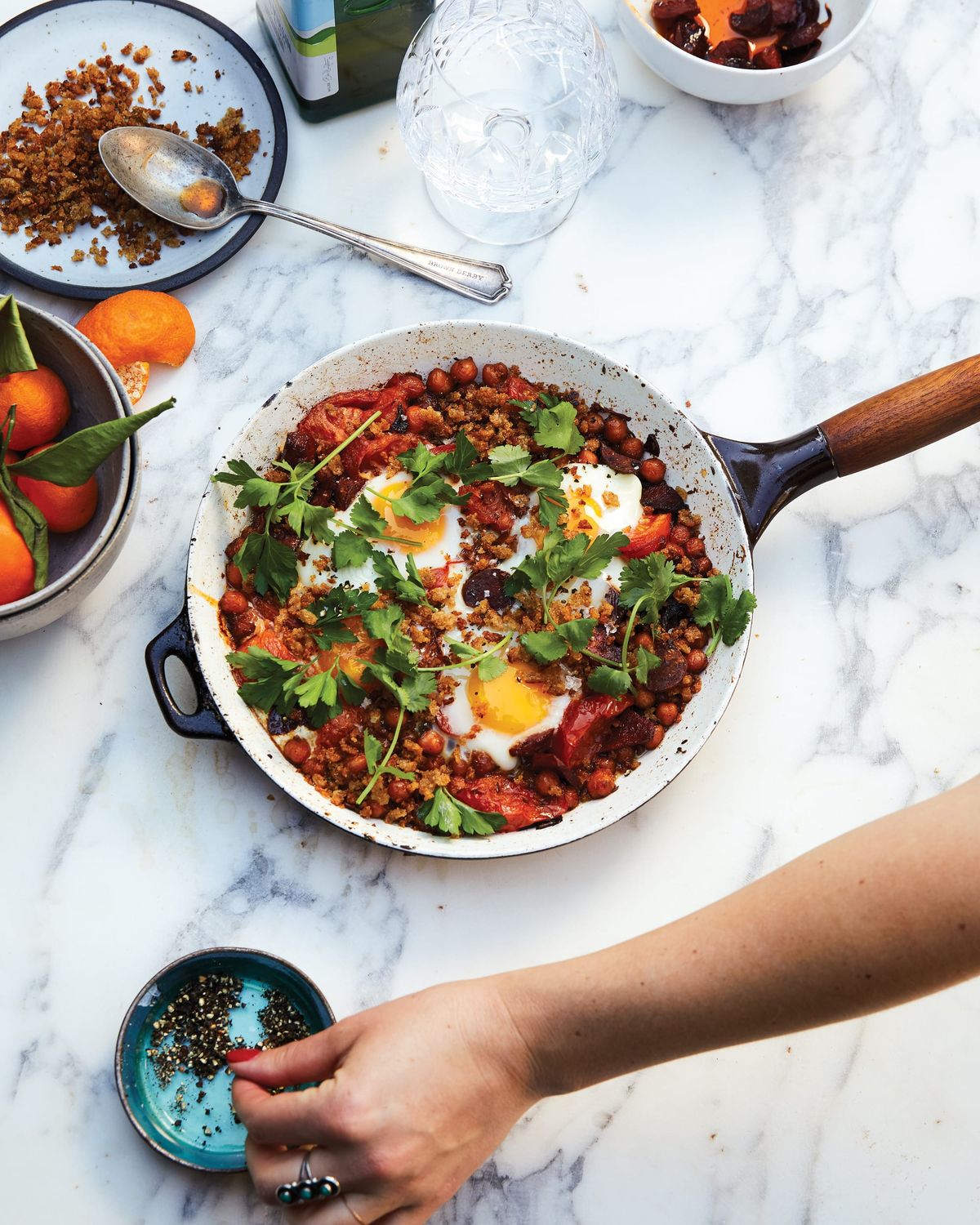 Baked Eggs with Crushed Chickpeas, Chorizo, and Bread Crumbs