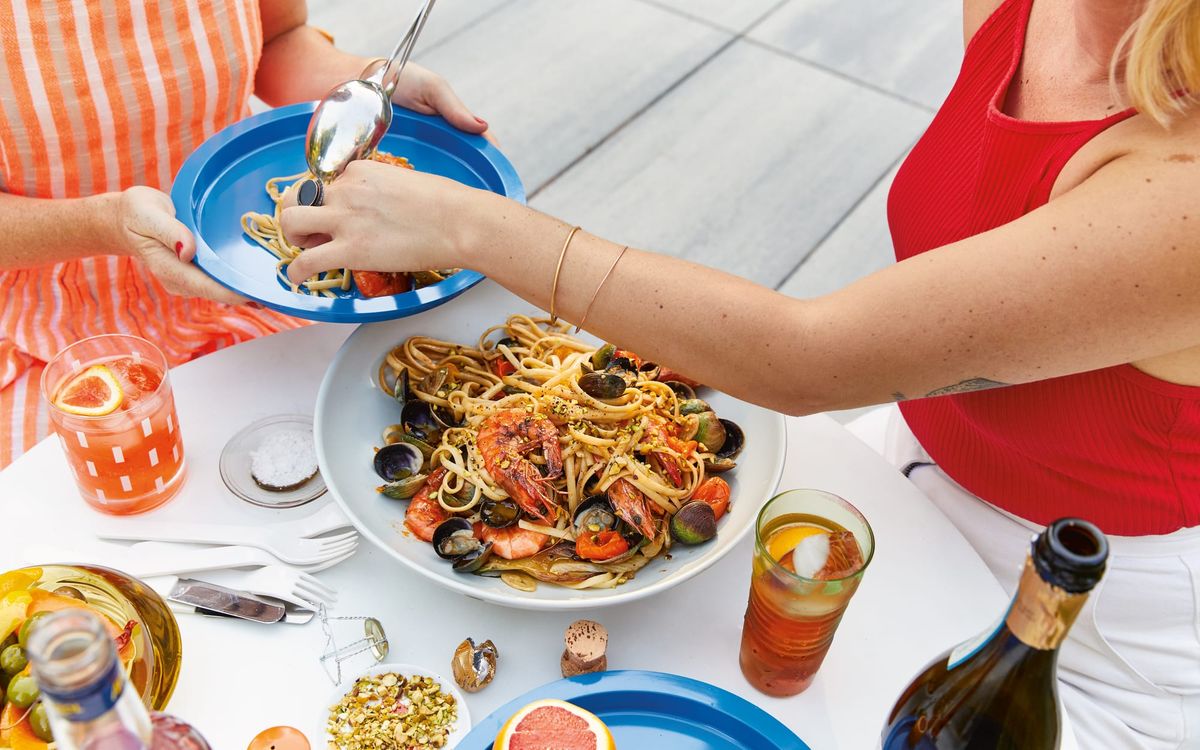 Sungold Pasta with Lemony Shellfish, Garlic, and Pistachios