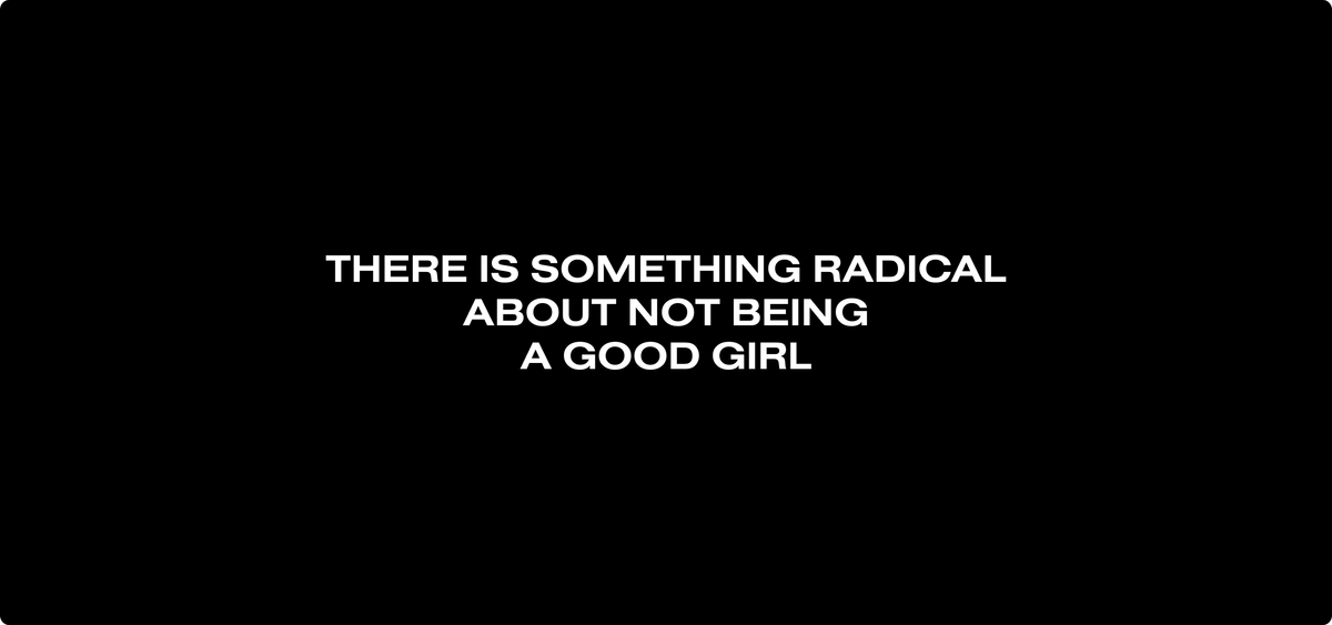 A black canvas with a white text on it, all capitals, that reads: There is something radical about not being a good girl