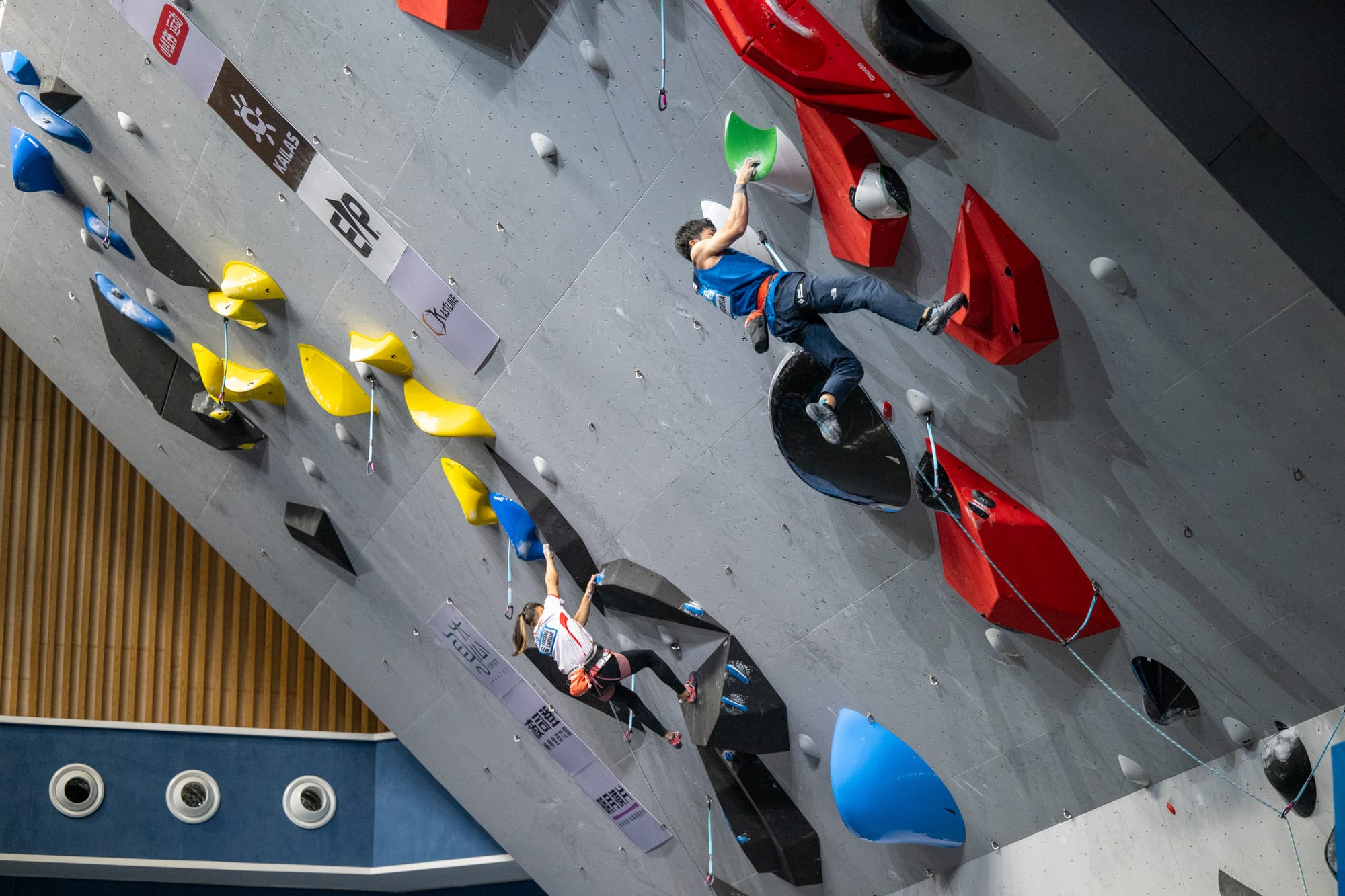 Satone Yoshida (Japan) completing the low crux to reach hold 16