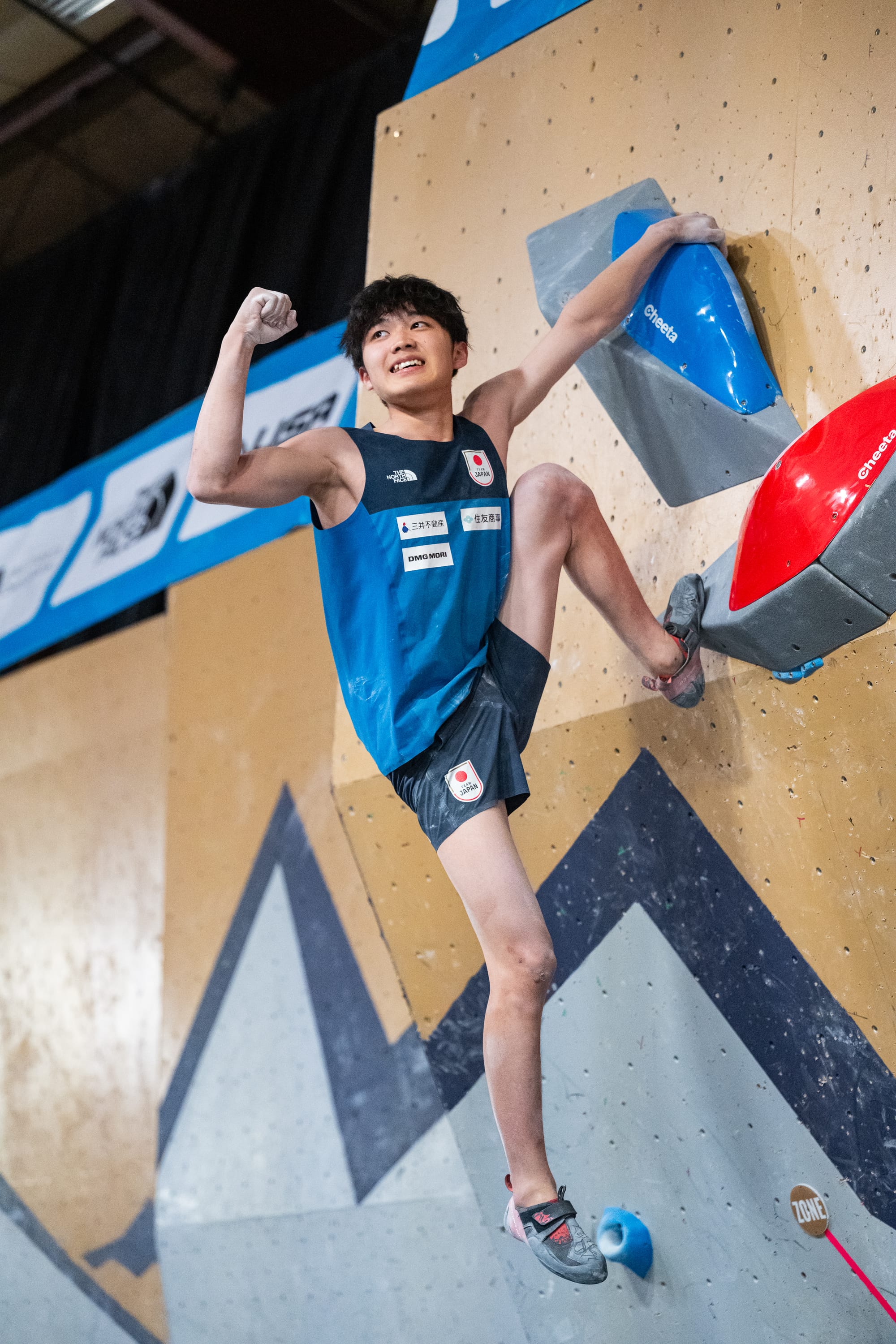 Sorato Anraku celebrating his win at the top of Boulder 4