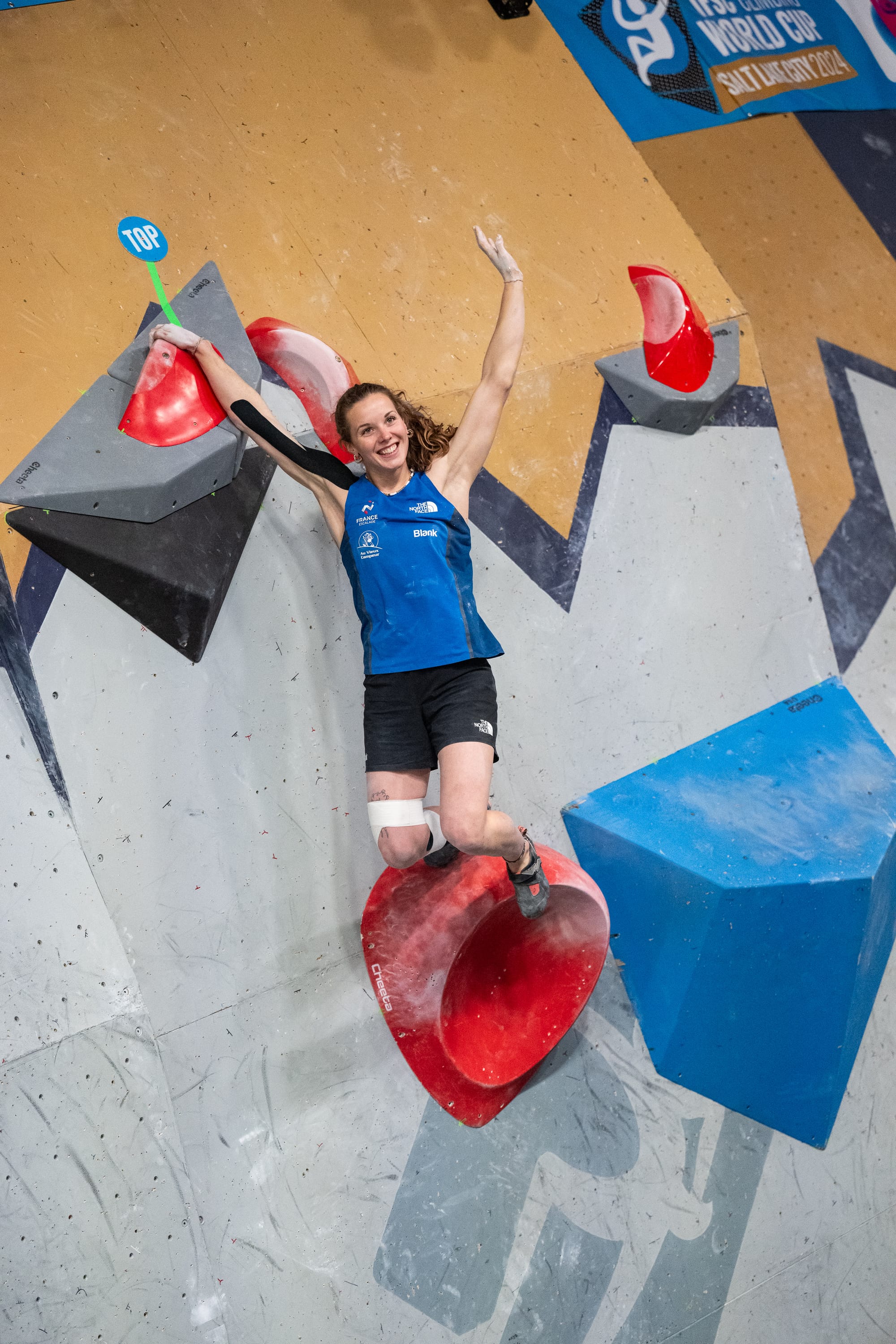 Naïle Meignan celebrating her top of boulder 2