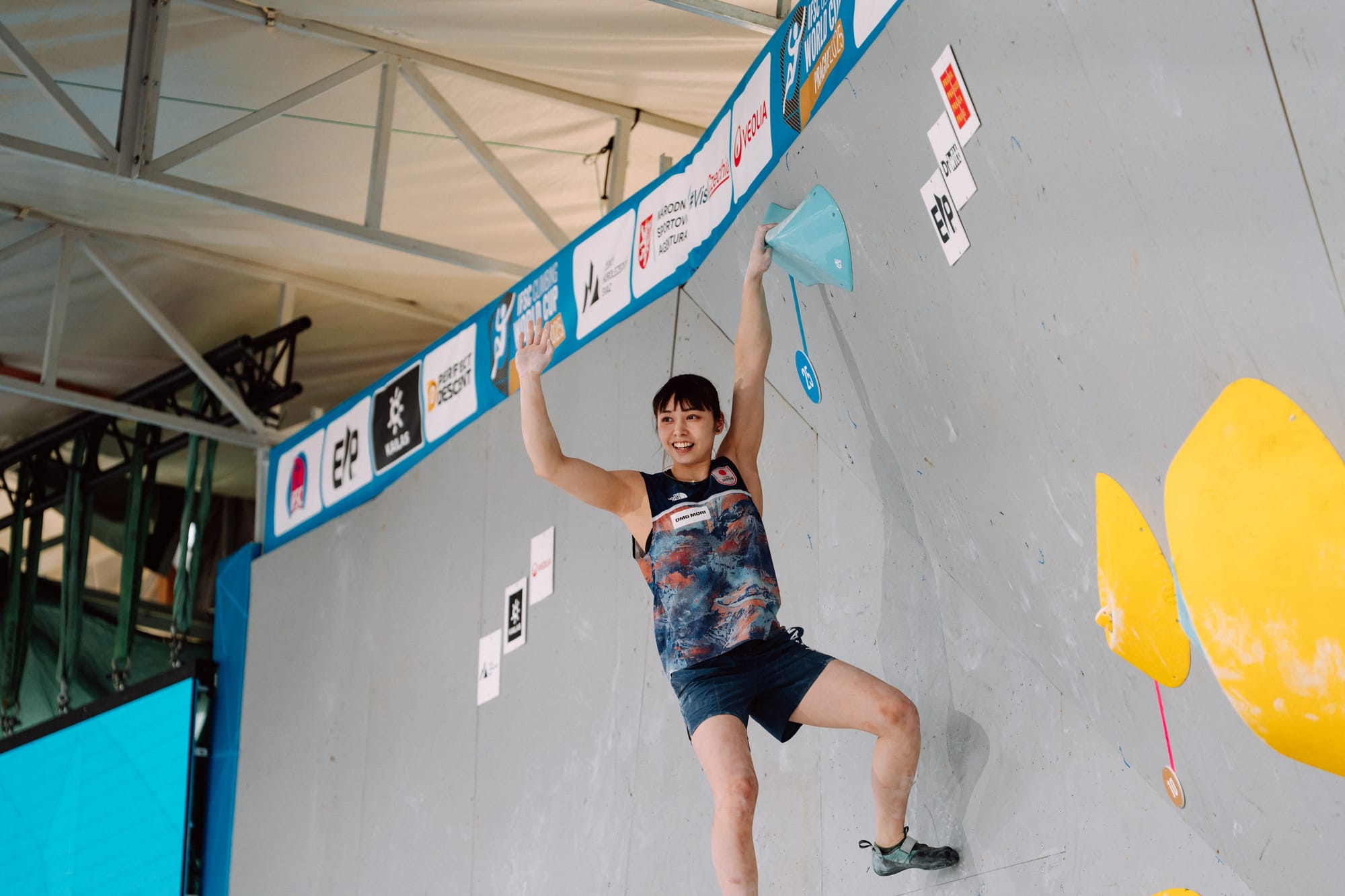 Melody Sekikawa celebrating at the top of W2 in the semi-final