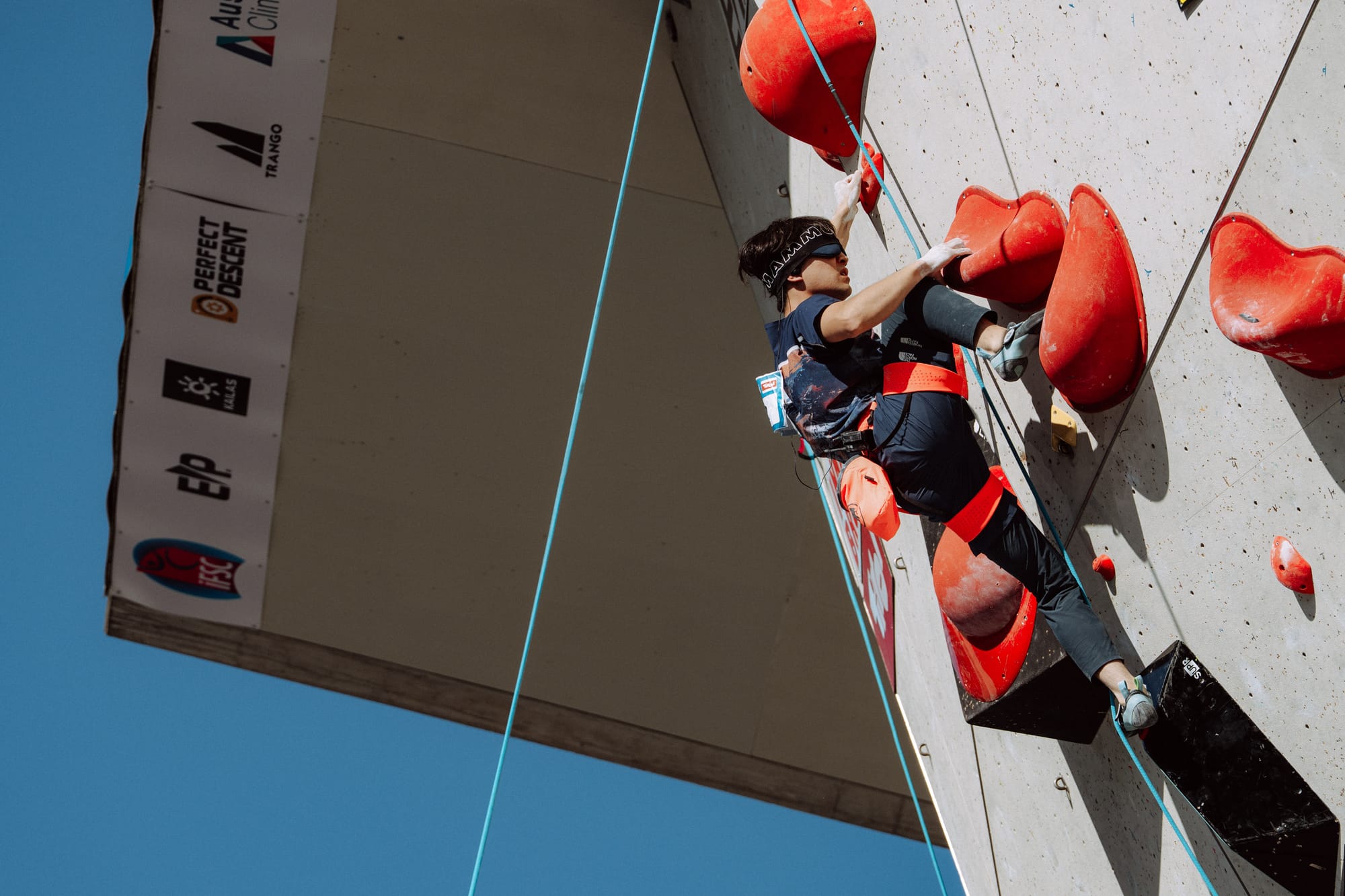 Sho Aita climbing on the final route