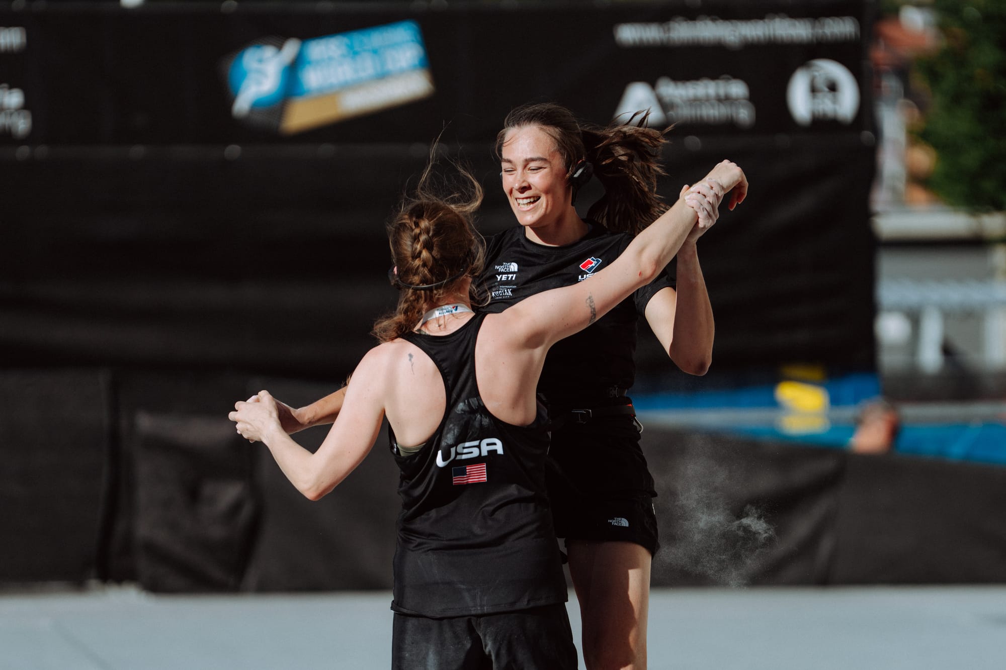 Seneida Biendarra and her sight guide celebrate