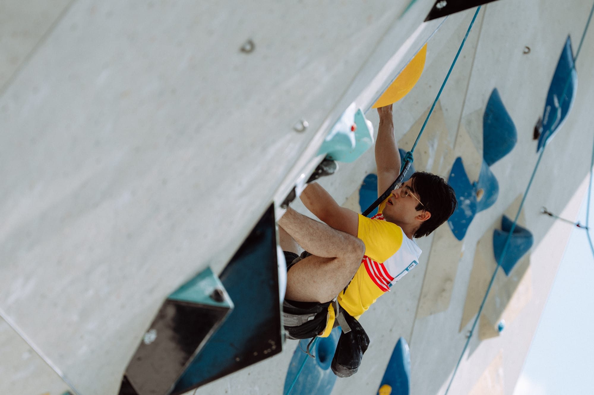 Camille Caulier climbing on the final route