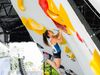 Valentina Aguado climbing on the qualification boulders at the Budapest OQS event last June