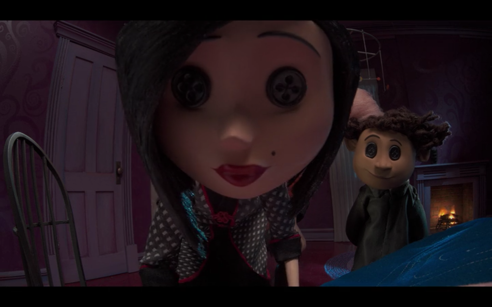 practice film vocabulary and descriptive writing with this closeup shot of the Other Mother in Coraline