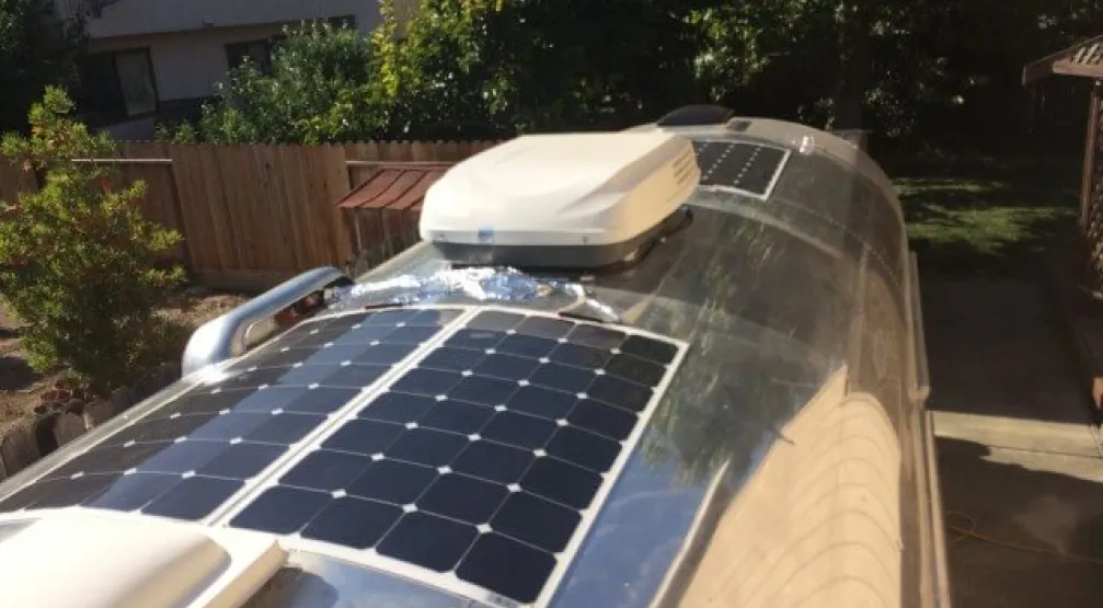Flexible solar panel fitted to a curved campervan roof