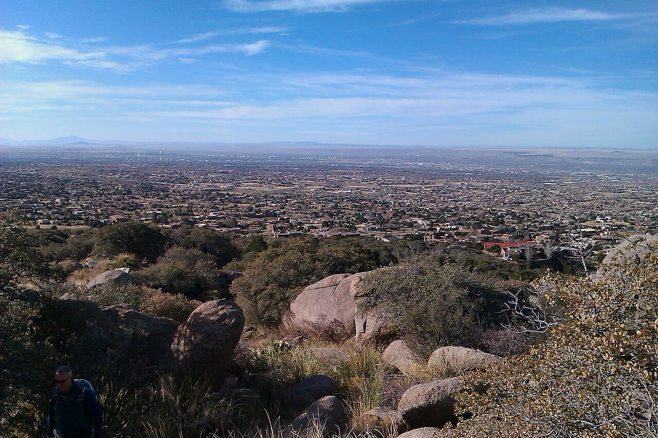 Granite boulders and high-desert scrub in the Sandia foothills overlooking Albuquerque