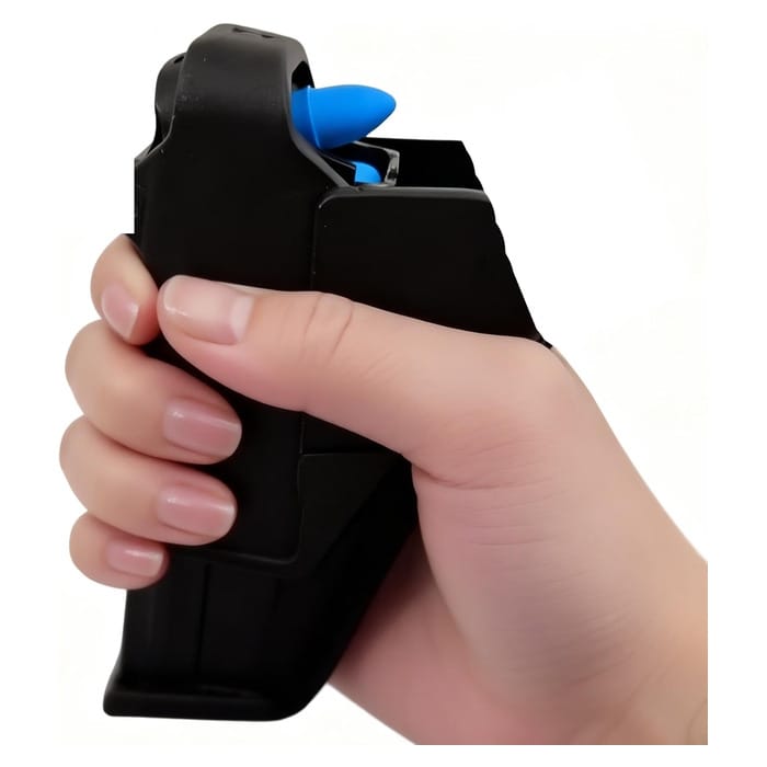 Black Maglula UpLULA magazine loader held in a hand