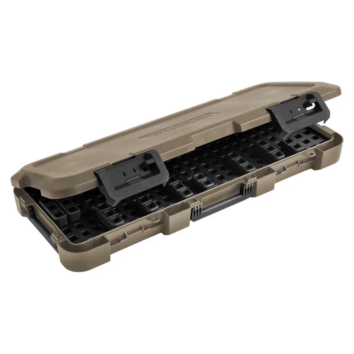 Open tan Magpul DAKA hard rifle case showing its black modular GRID interior and two latches.