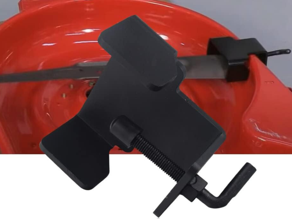 A mower blade removal tool installed and on display