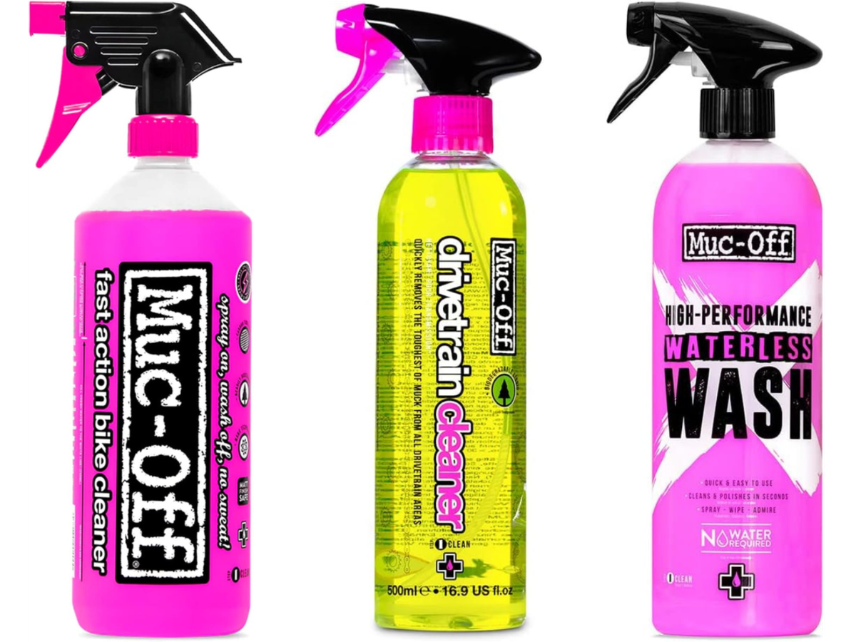Muc-Off Waterless Wash, Drivetrain Cleaner, and Bike Cleaner all shown as spray bottles