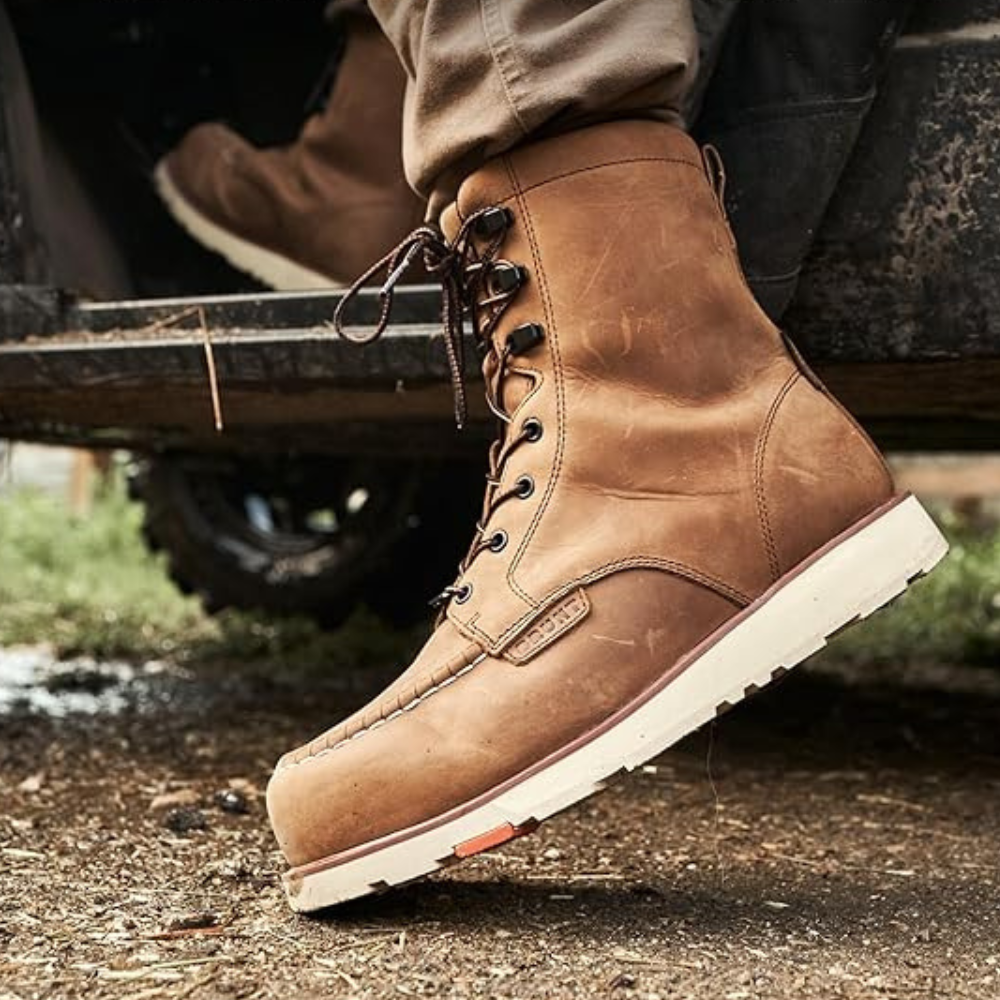 A man wearing a work boot getting into a vehicle with Brunt on the side.