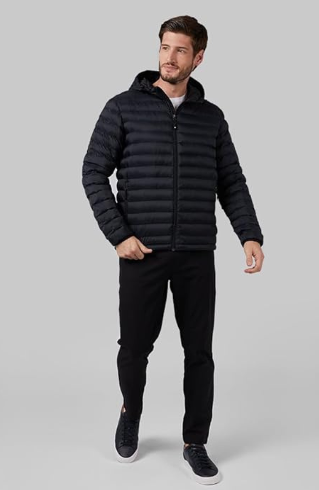 A man wearing a black Heat Jacket from 32 Degrees.