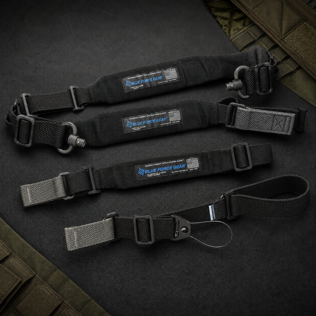Multiple Blue Force Gear Vickers Sling models featuring padded webbing, quick-adjust pull tabs, buckles, and QD attachment hardware.