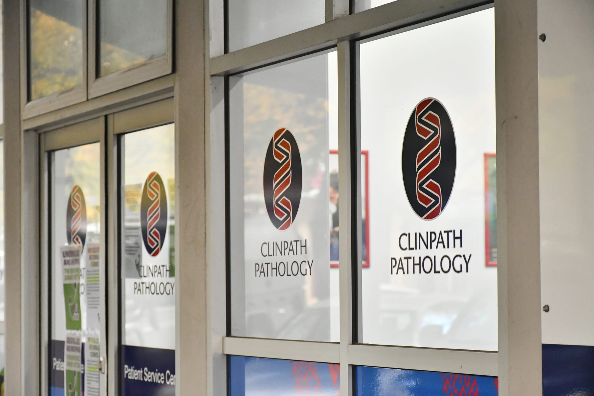 Pathology staff take action over under-payment