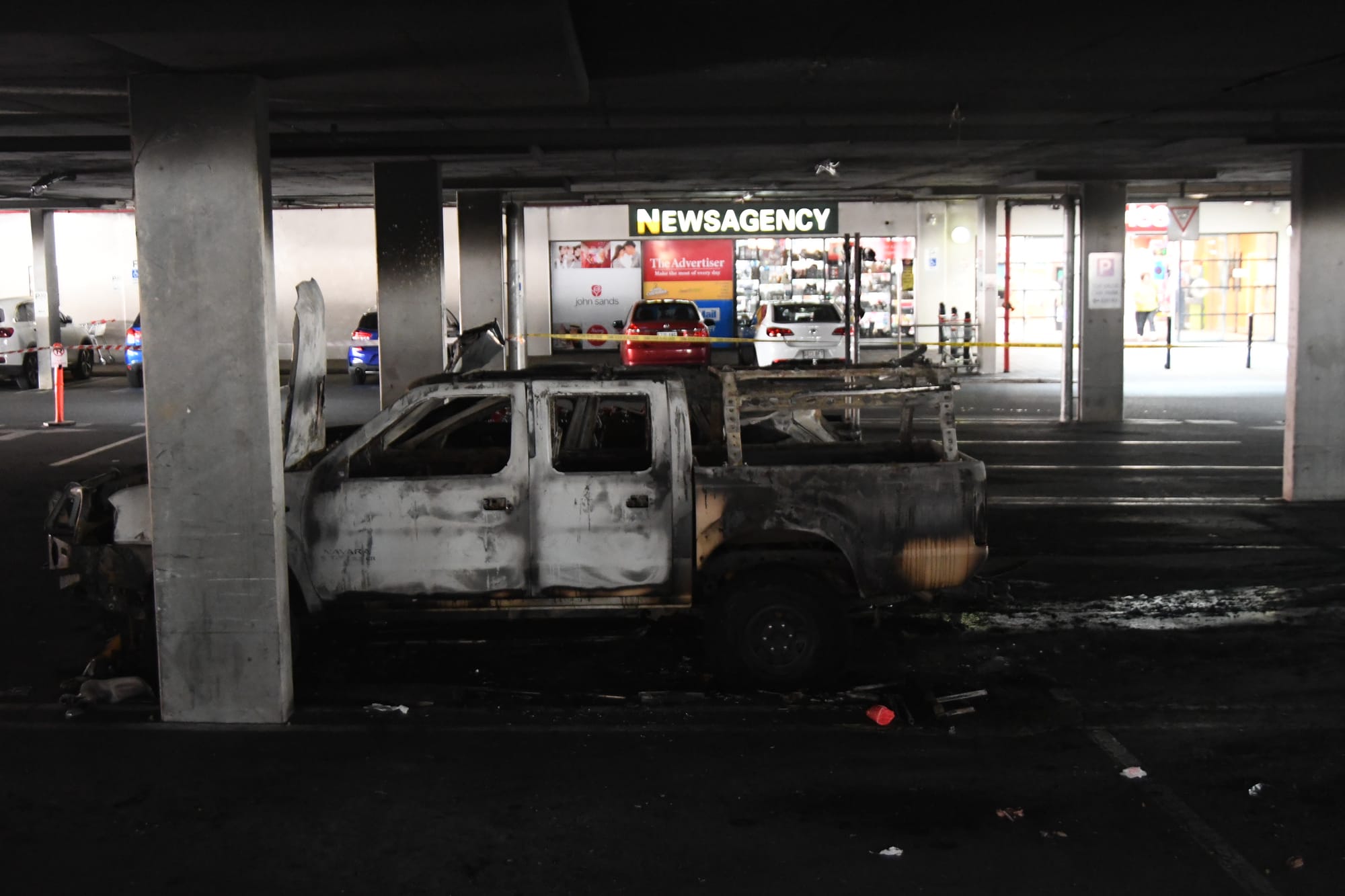 Cars ignite in shopping centre car park