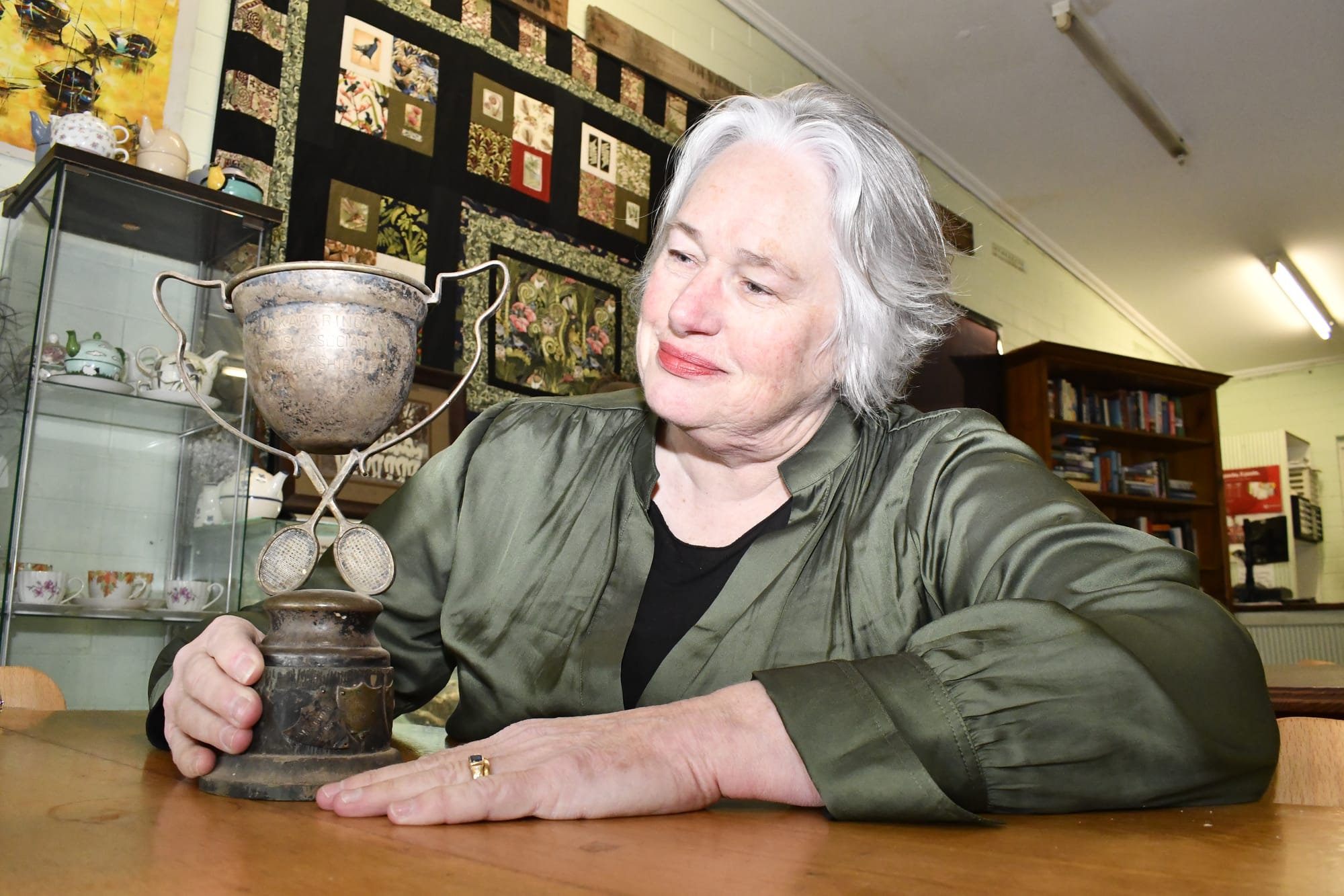 Mystery surrounds trophy found in creek