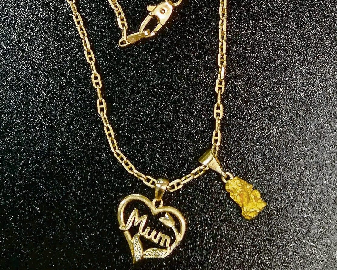Police seek owner of necklace, pendants found on street