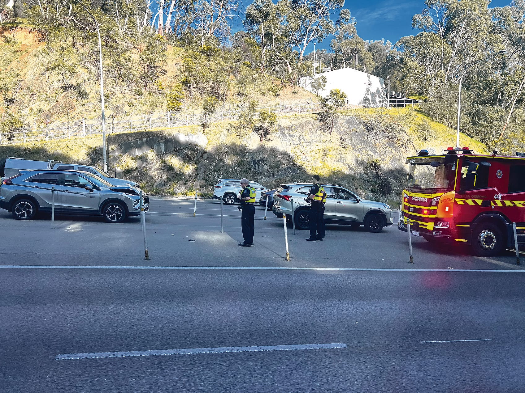 Tailgater fined after three-car freeway crash