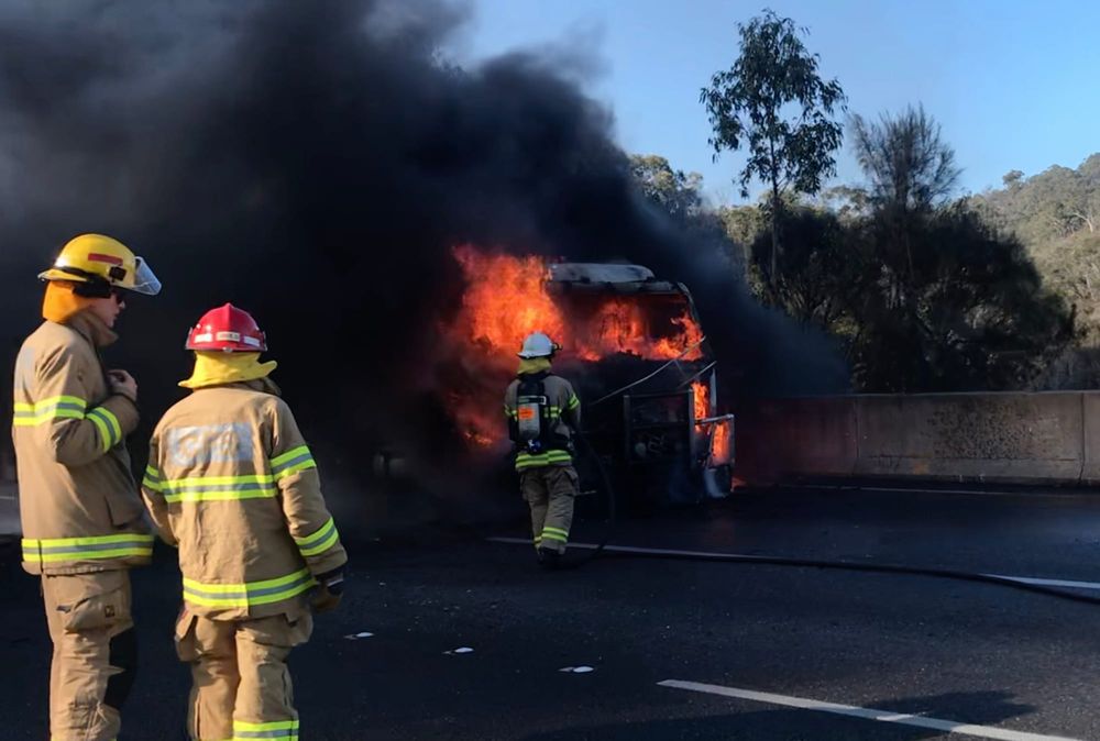 Truck catches fire on freeway post image