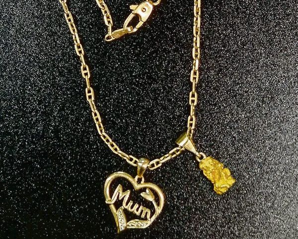 Police seek owner of necklace, pendants found on street post image
